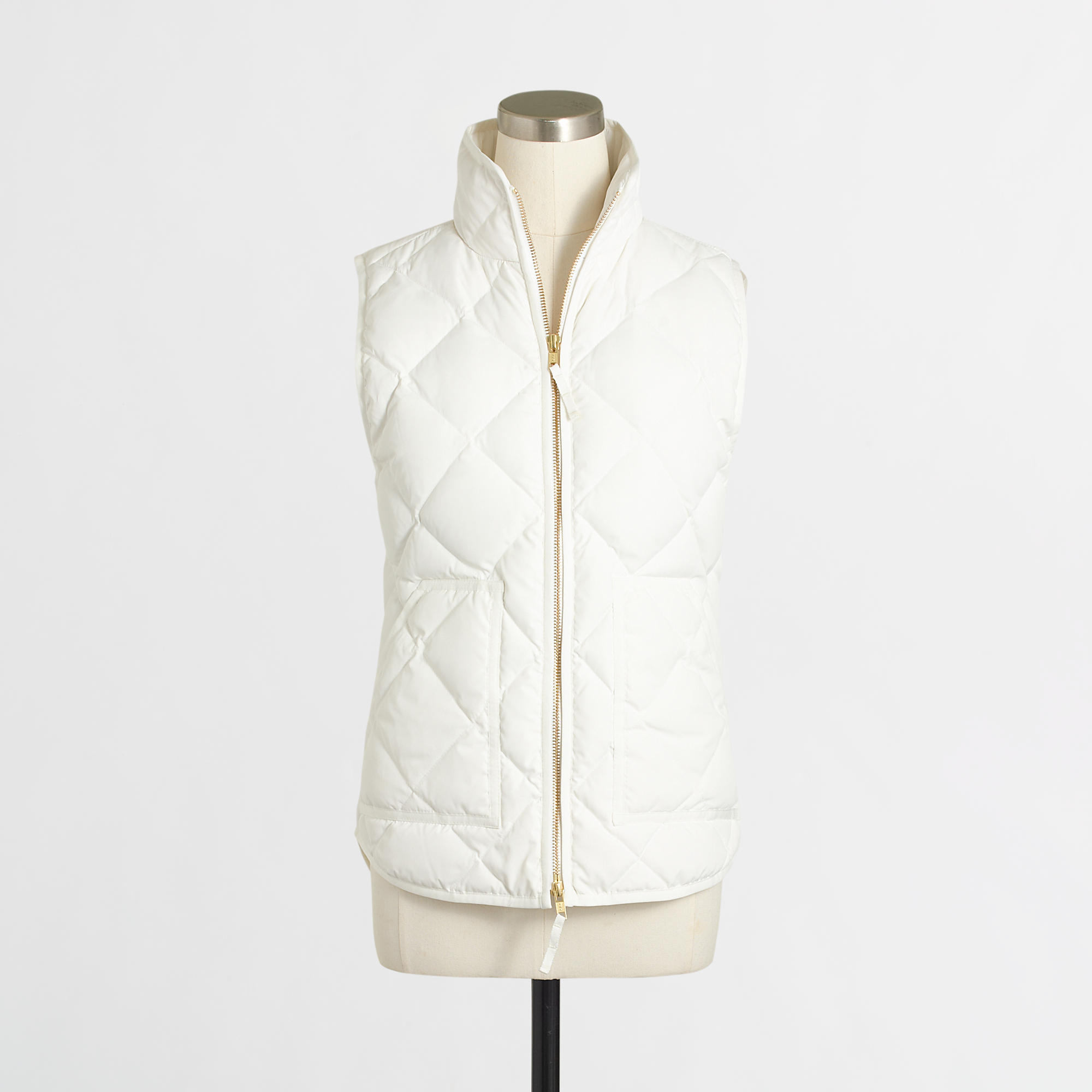 J Crew Flannel Shirt, White Puffer Vest, and Louis Vuitton Speedy