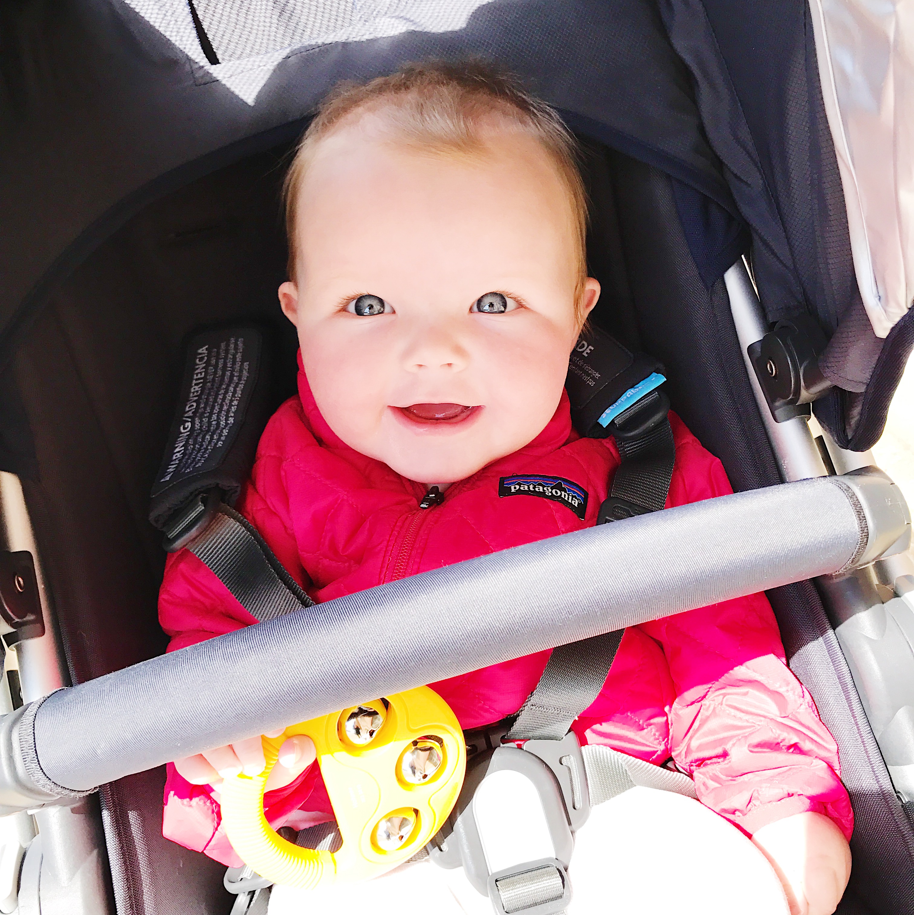 The sun came out and we went to the toy store! Emma's wearing Baby Patagonia.