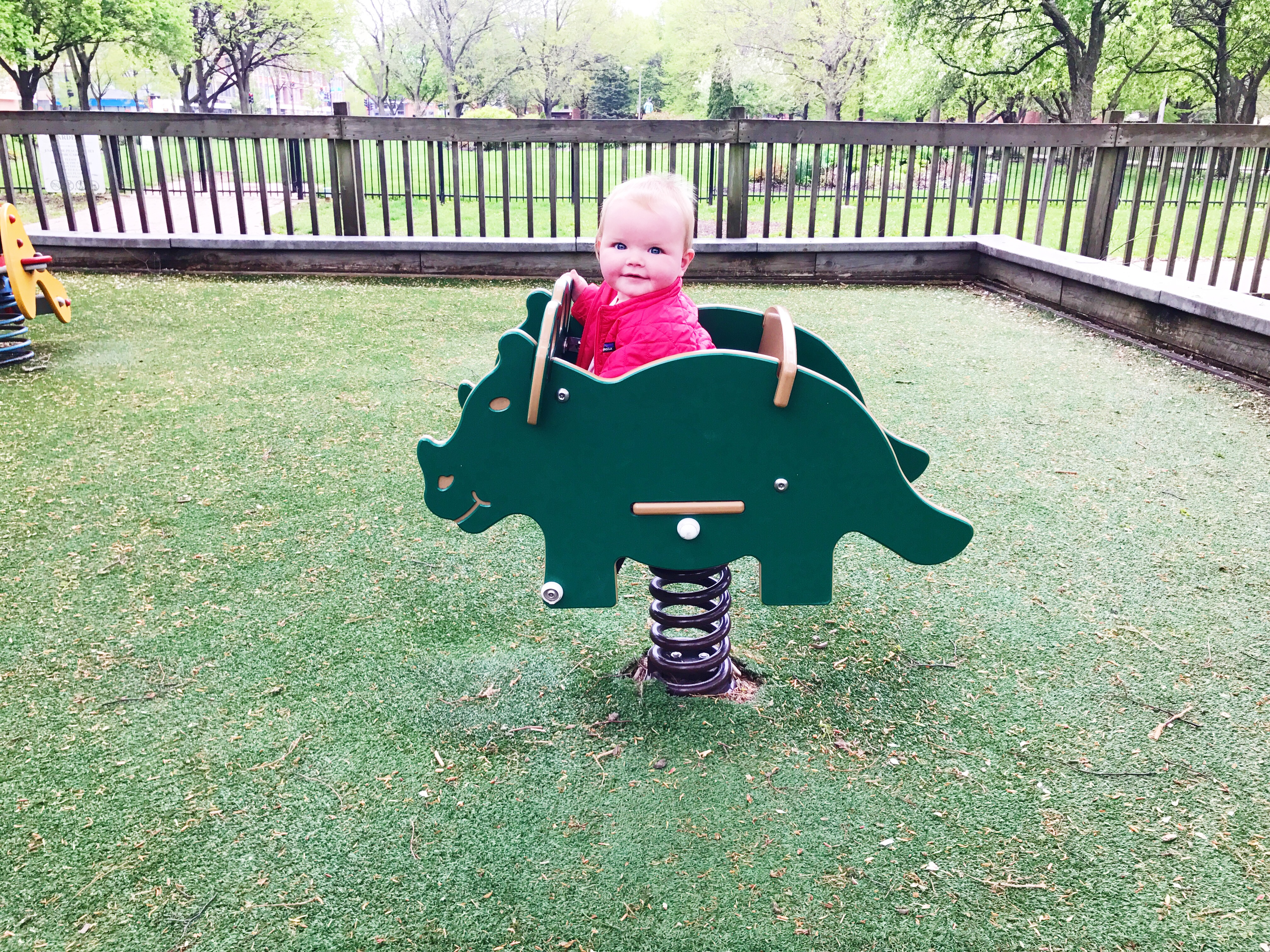 Emma's favorite: the dinosaur at Oz Park, right before the rain started.