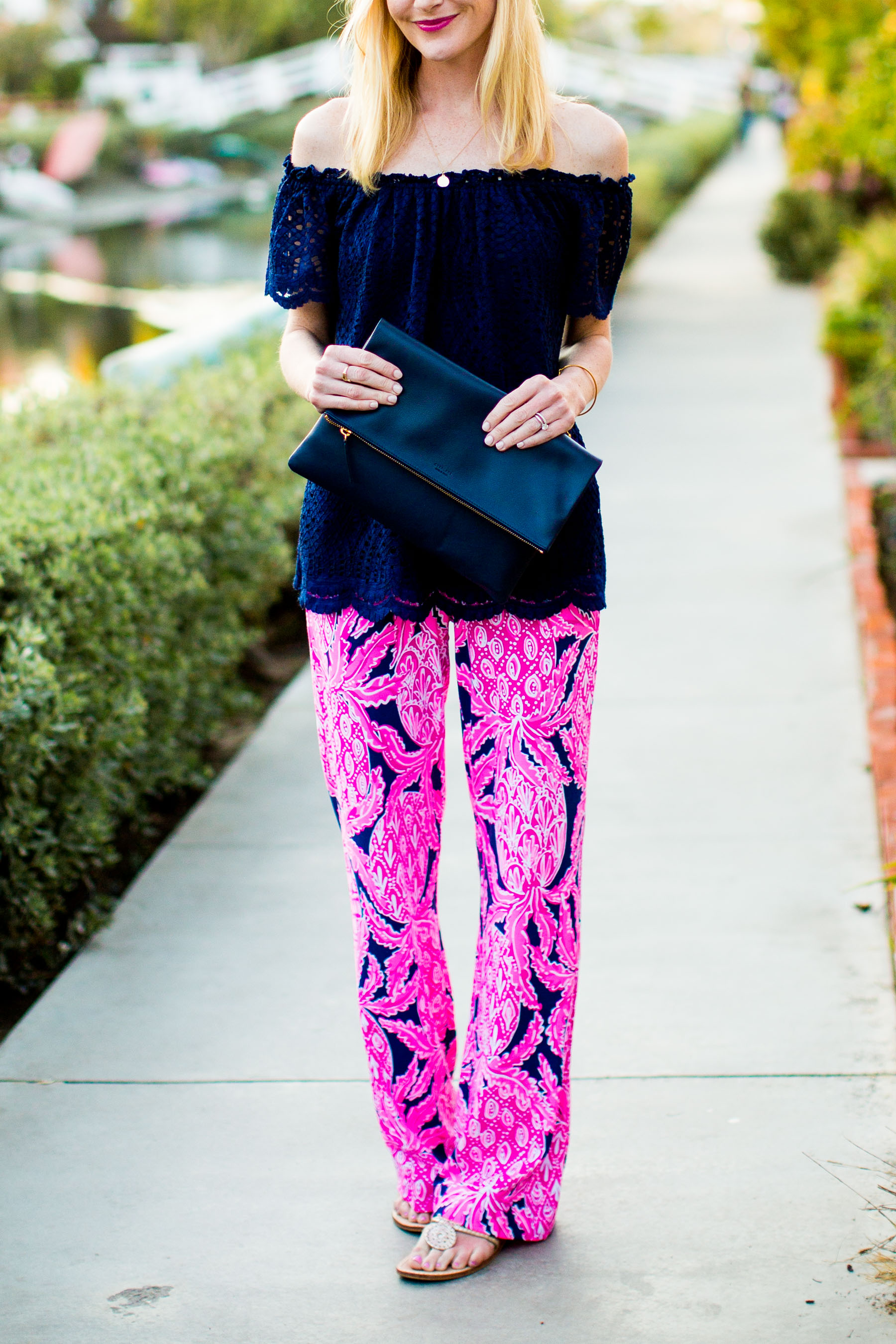 Lilly Pulitzer Pants and Off-the-Shoulder Top / Jack Rogers Flip Flop / Everlane Clutch 