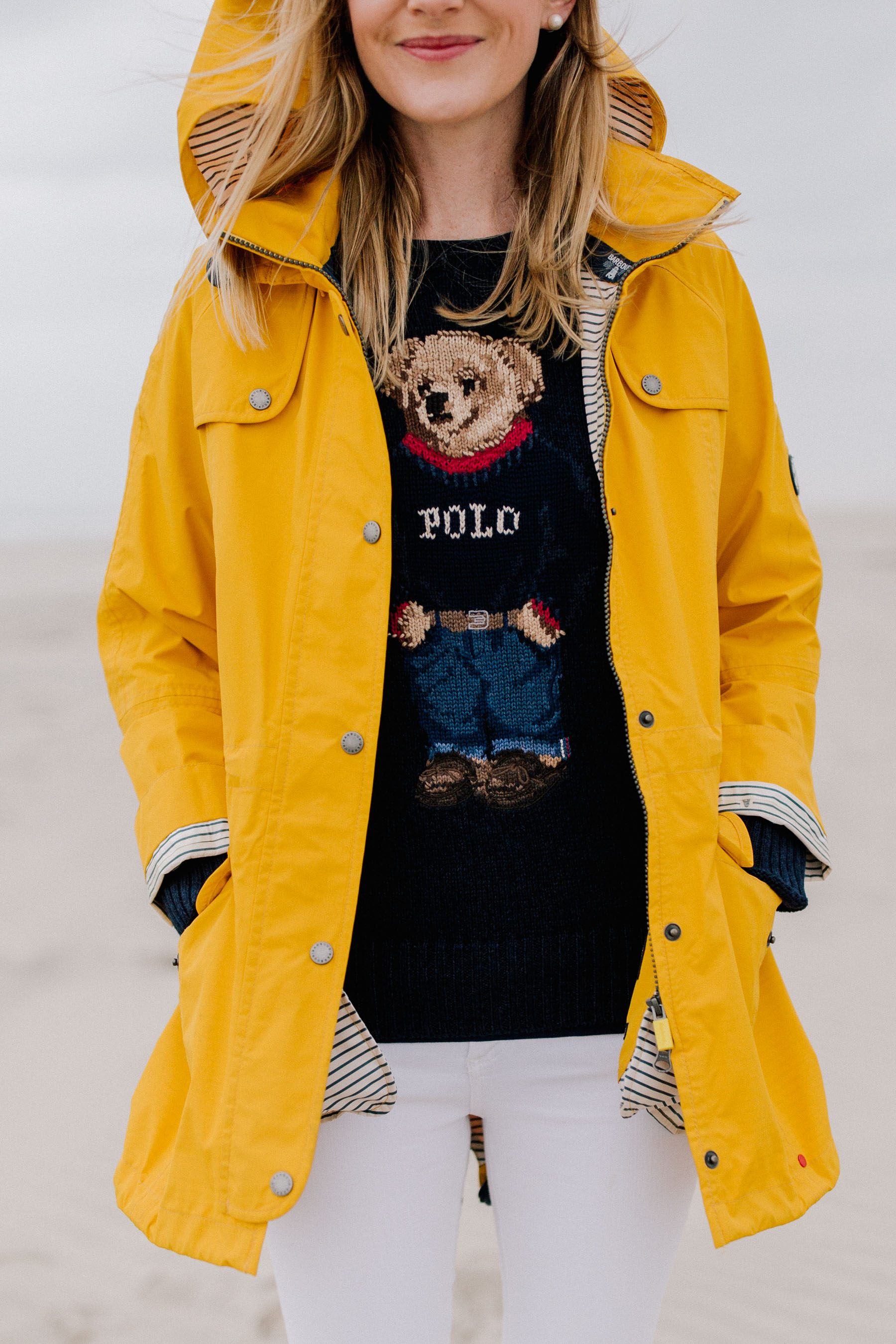 teddy bear in yellow raincoat