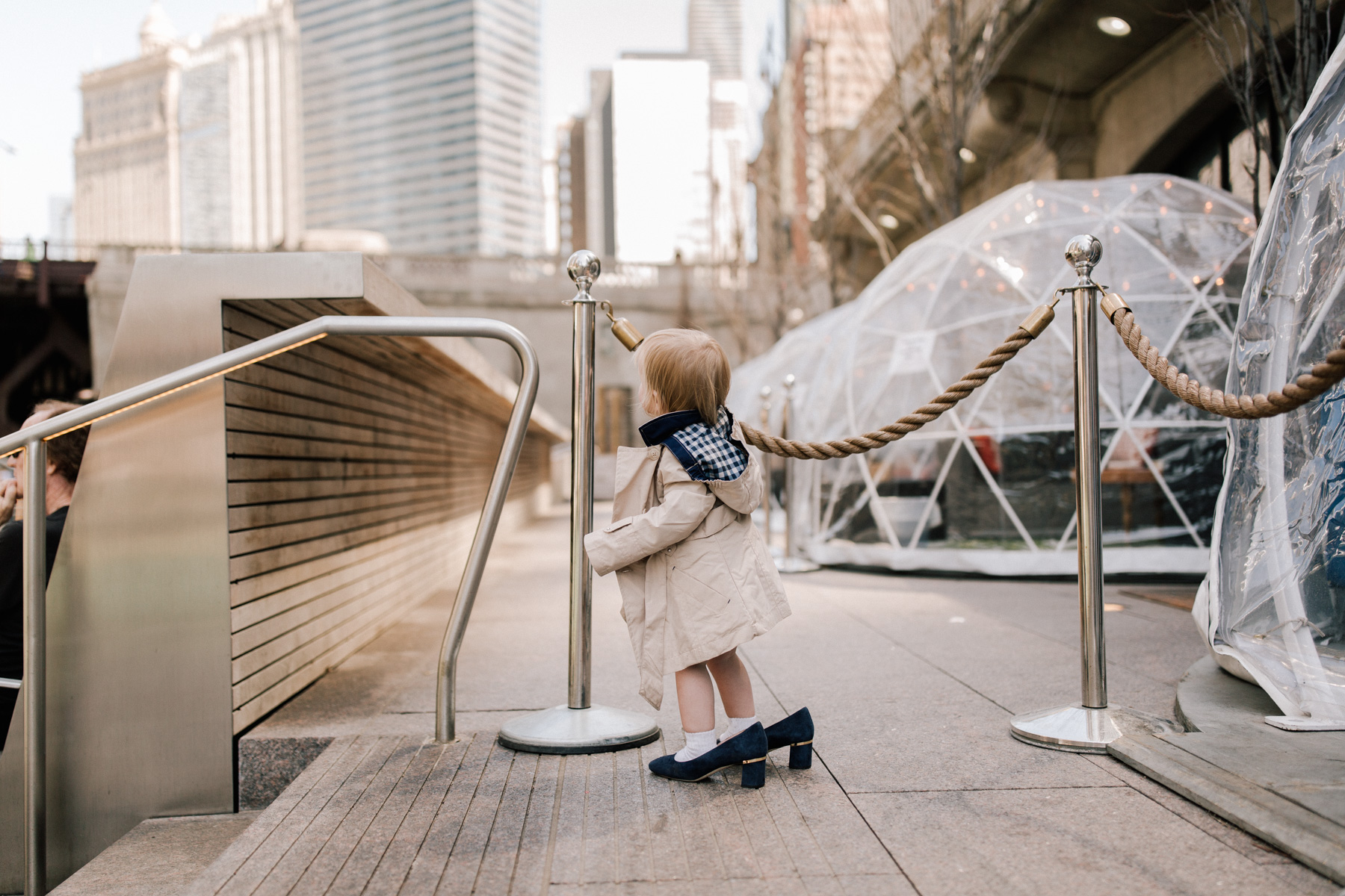 Toddler in a Trench Coat and heels