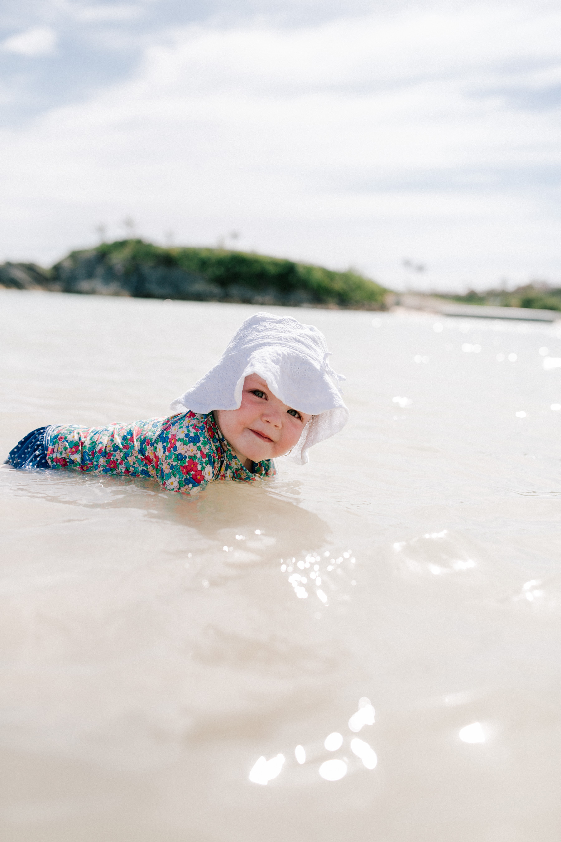 Baby Emma playing at a Private Bermudian Beach | Kelly in the City