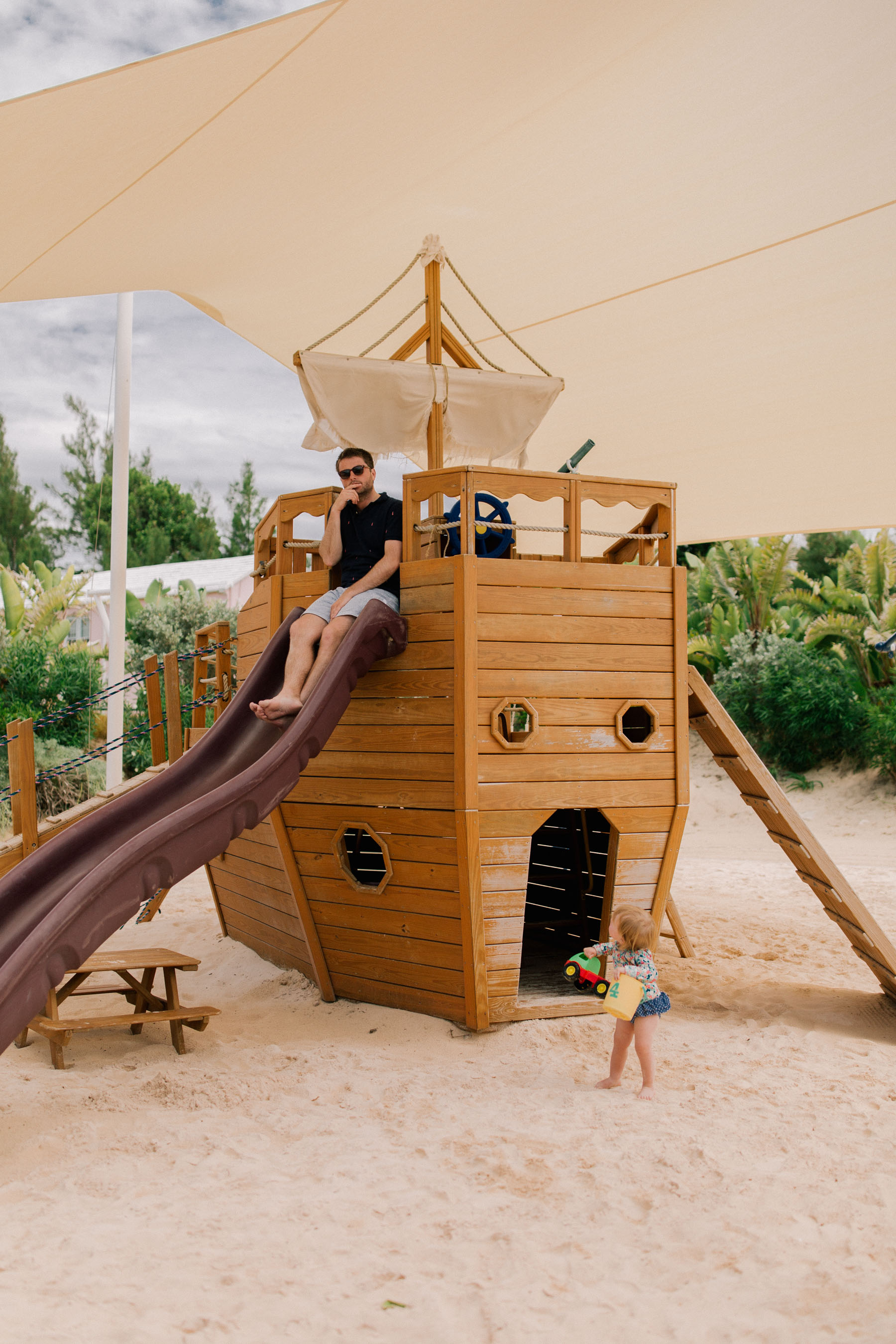 Mitch and Baby Emma playing at a Private Bermudian Beach | Kelly in the City