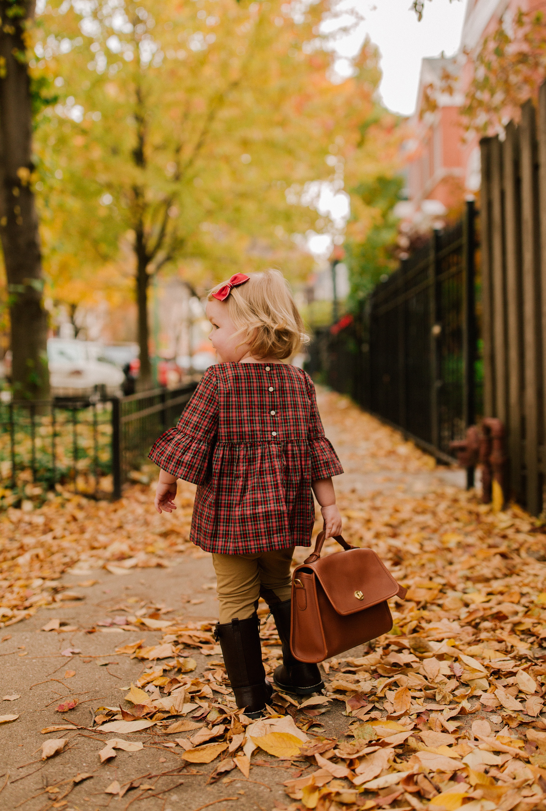 On Emma: Equestrian Leggings, Plaid Top, Red Teddy Bear Sweater 