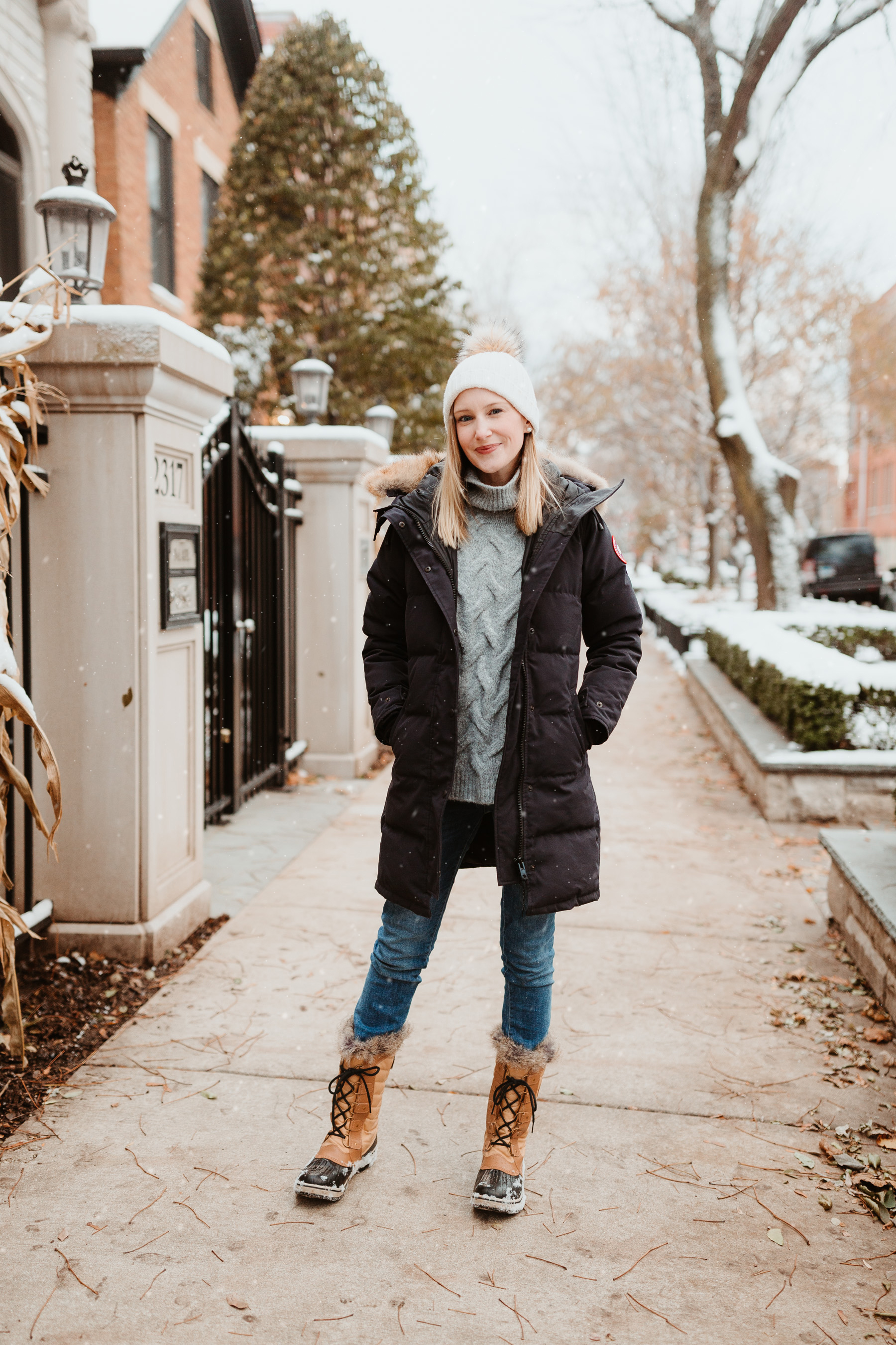 Kelly: Cable-Knit Sweater, Navy Down Parka, Sorel Tofino II Boots and DL1961 Jeans