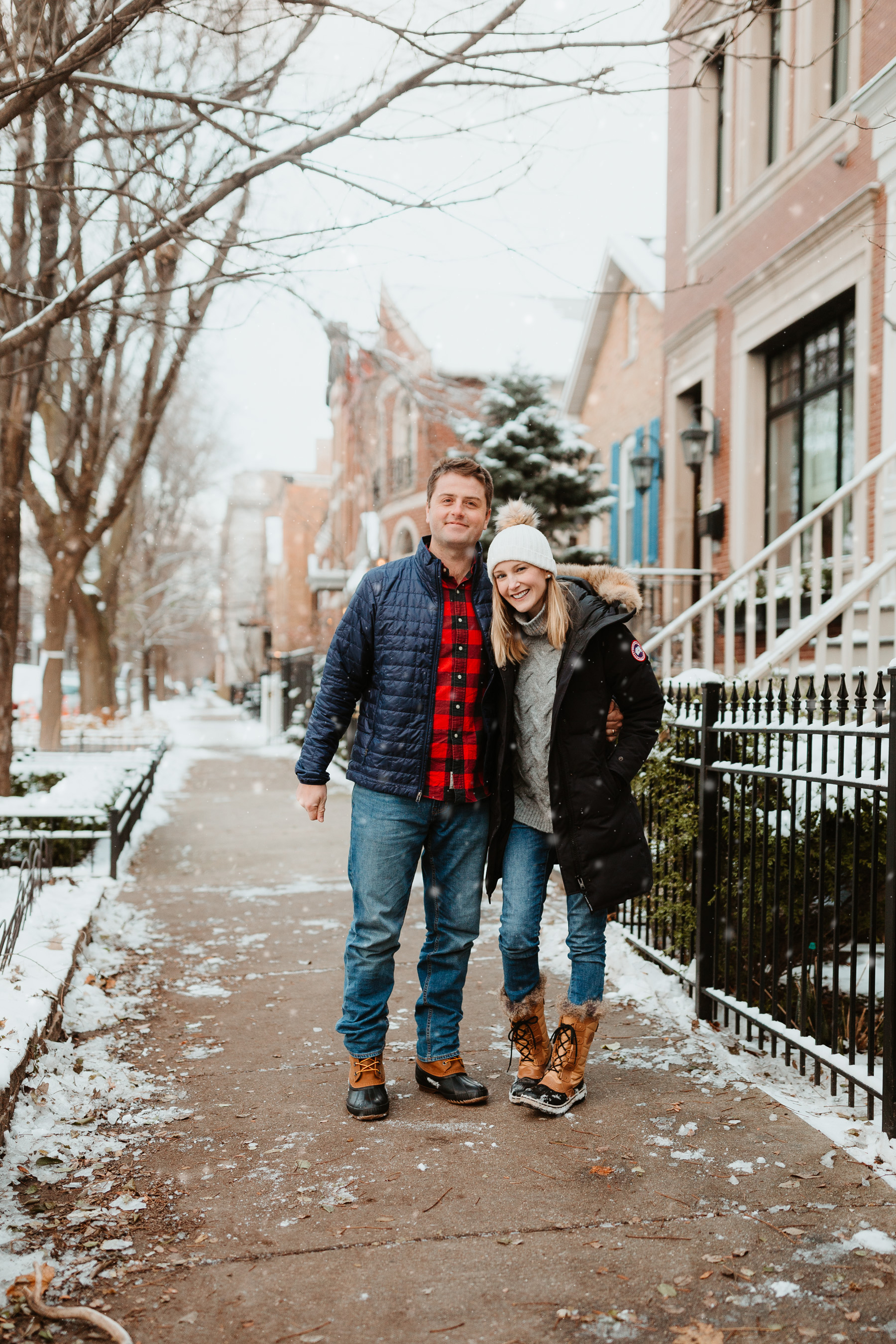 Mitch: Patagonia Nano Puff and Sorel Cheyenne Waterproof Boot / Kelly: Cable-Knit Sweater, Navy Down Parka, Sorel Tofino II Boots and DL1961 Jeans