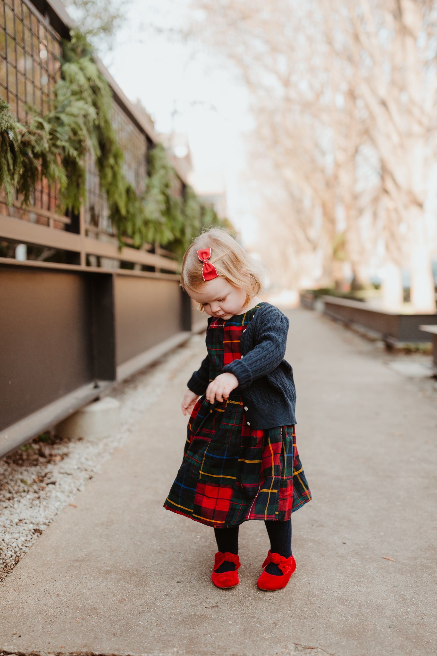 Emma is wearing a Plaid Dress (This is just the cutest, too! More holiday looks here.) / red shoes / navy cardigan - Polo Ralph Lauren