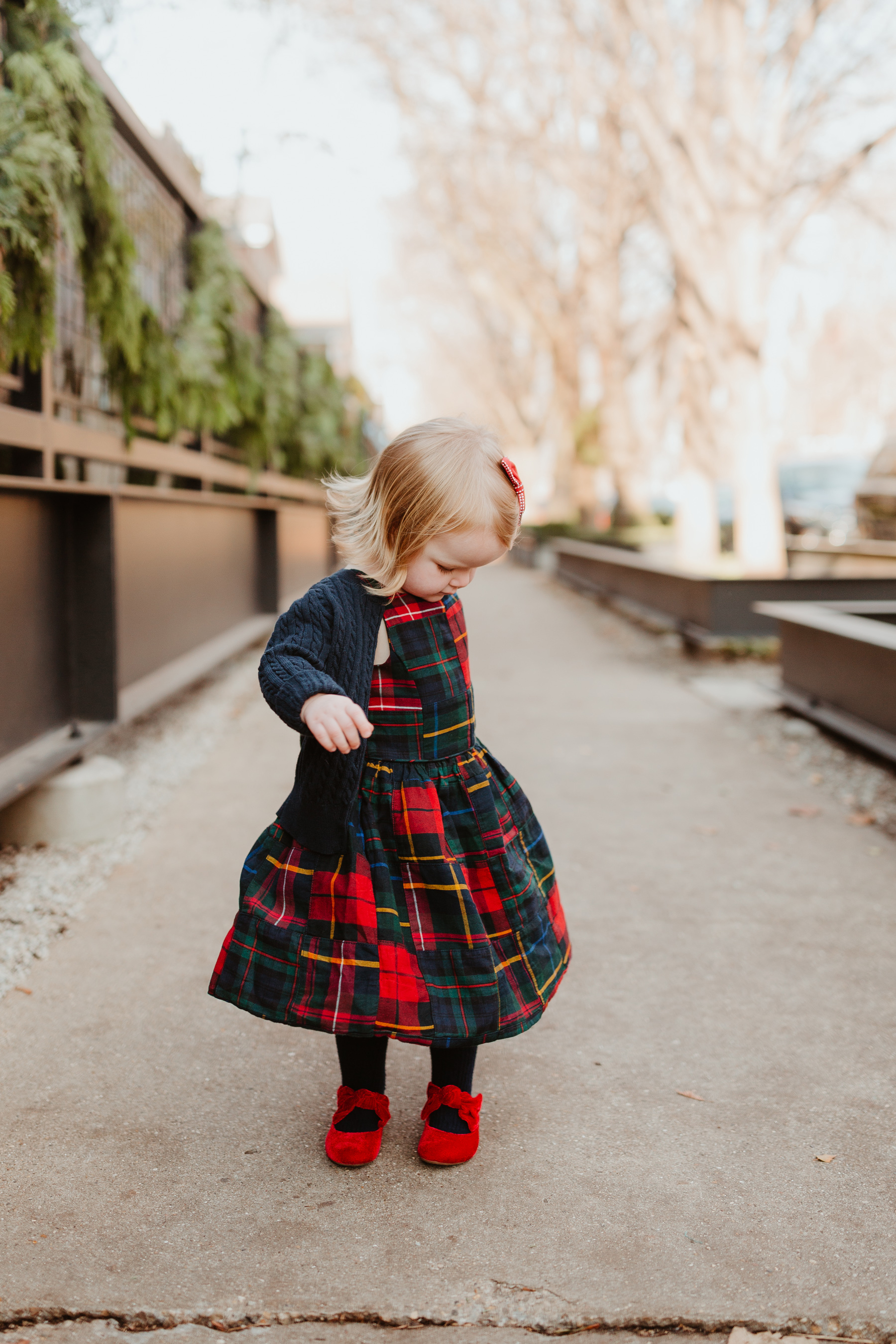 Emma is wearing a Plaid Dress (This is just the cutest, too! More holiday looks here.) / red shoes / navy cardigan - Polo Ralph Lauren