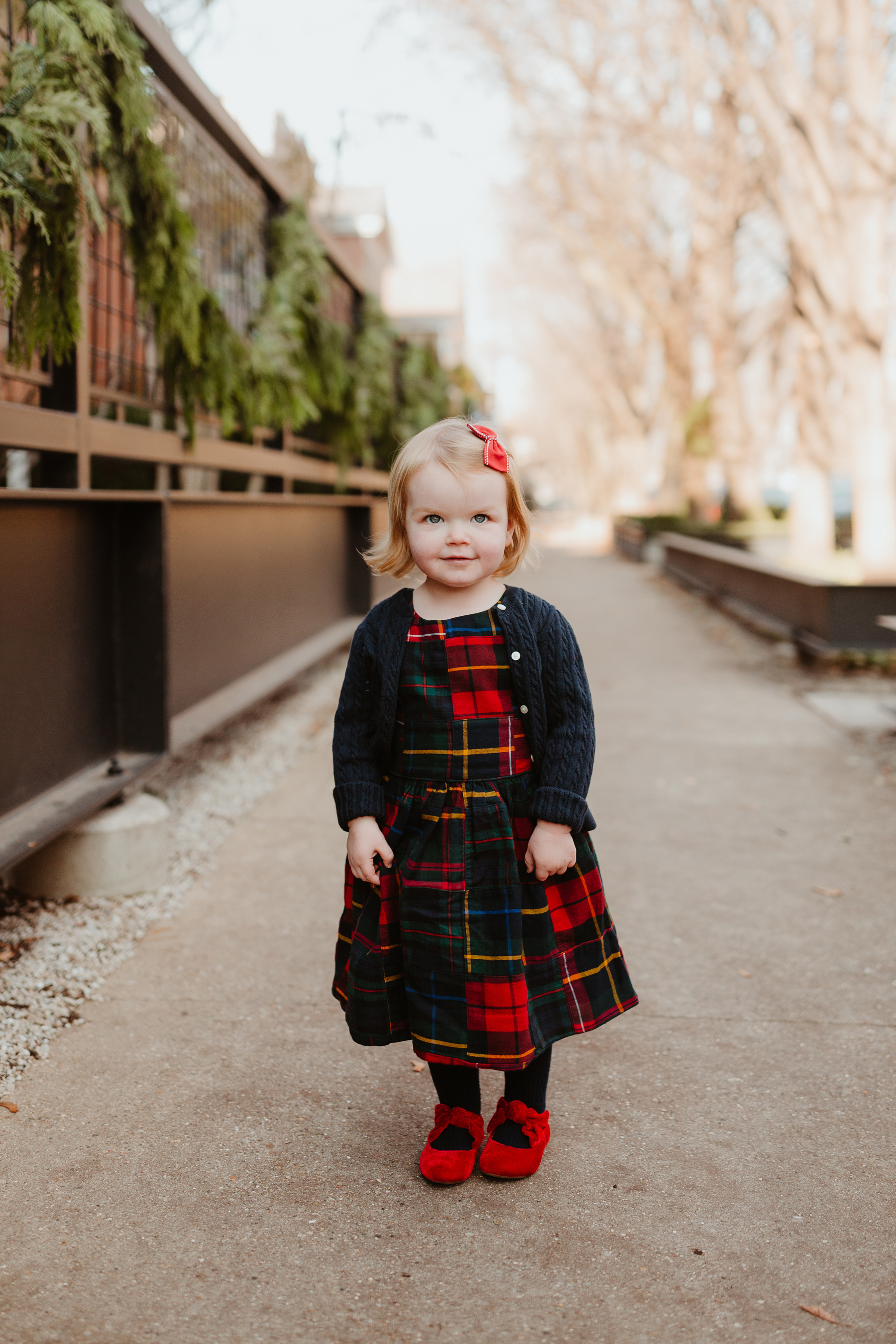 Emma is wearing a Plaid Dress (This is just the cutest, too! More holiday looks here.) / red shoes / navy cardigan - Polo Ralph Lauren