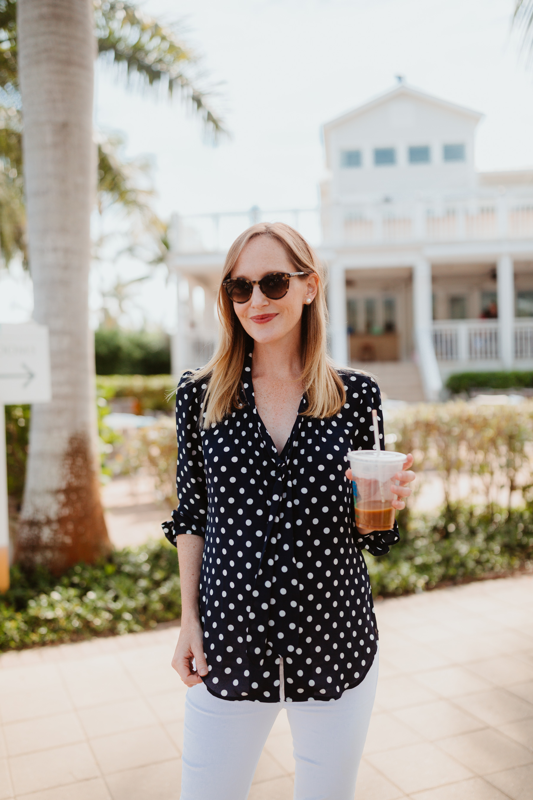 Kelly Larkin Outfit Details: J.Crew Navy Polka Dot Top / J Brand Maternity Ankle Jeans 