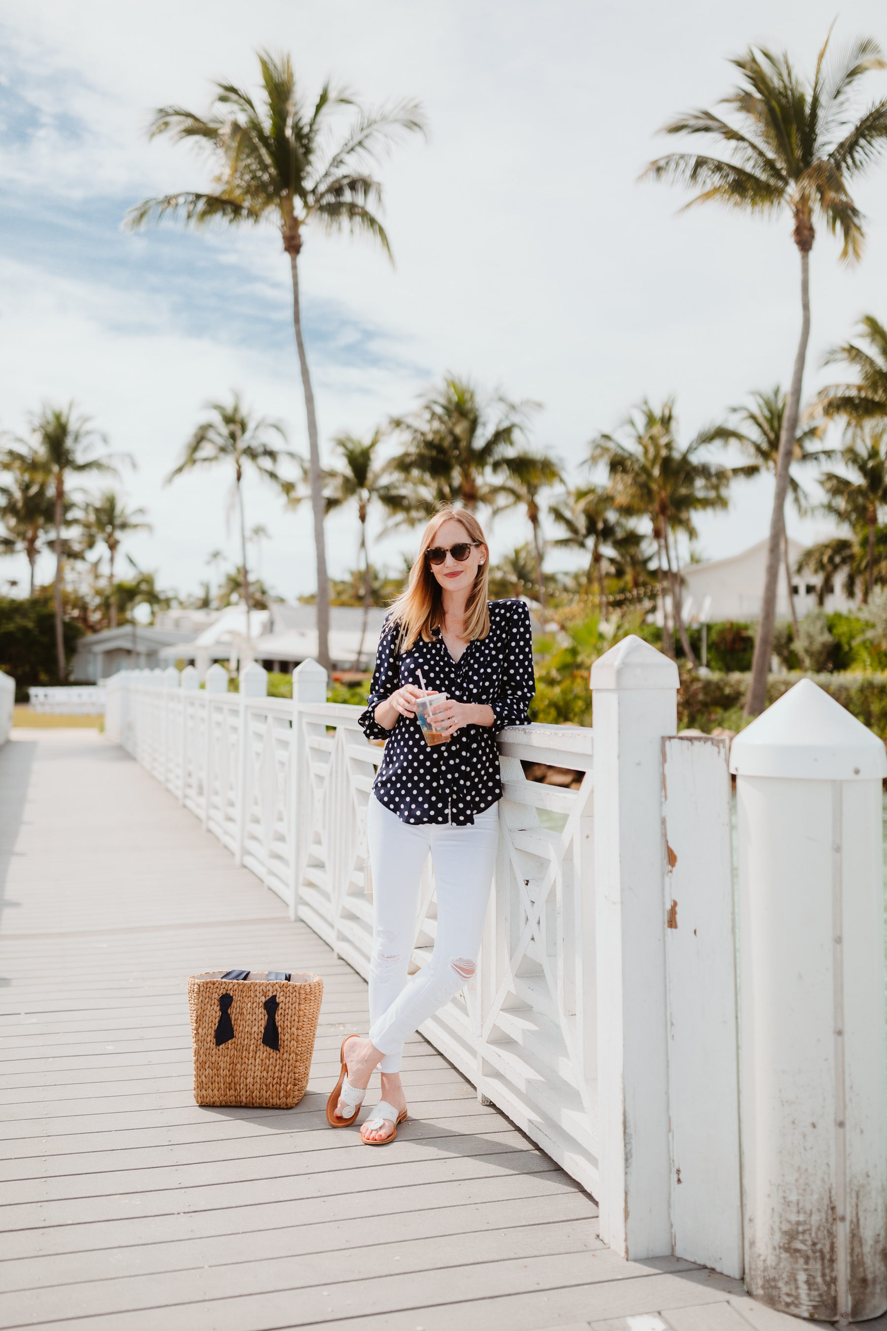 Kelly Larkin Outfit Details: J.Crew Navy Polka Dot Top / Pamela Munson Woven Tote / Jack Rogers / J Brand Maternity Ankle Jeans 