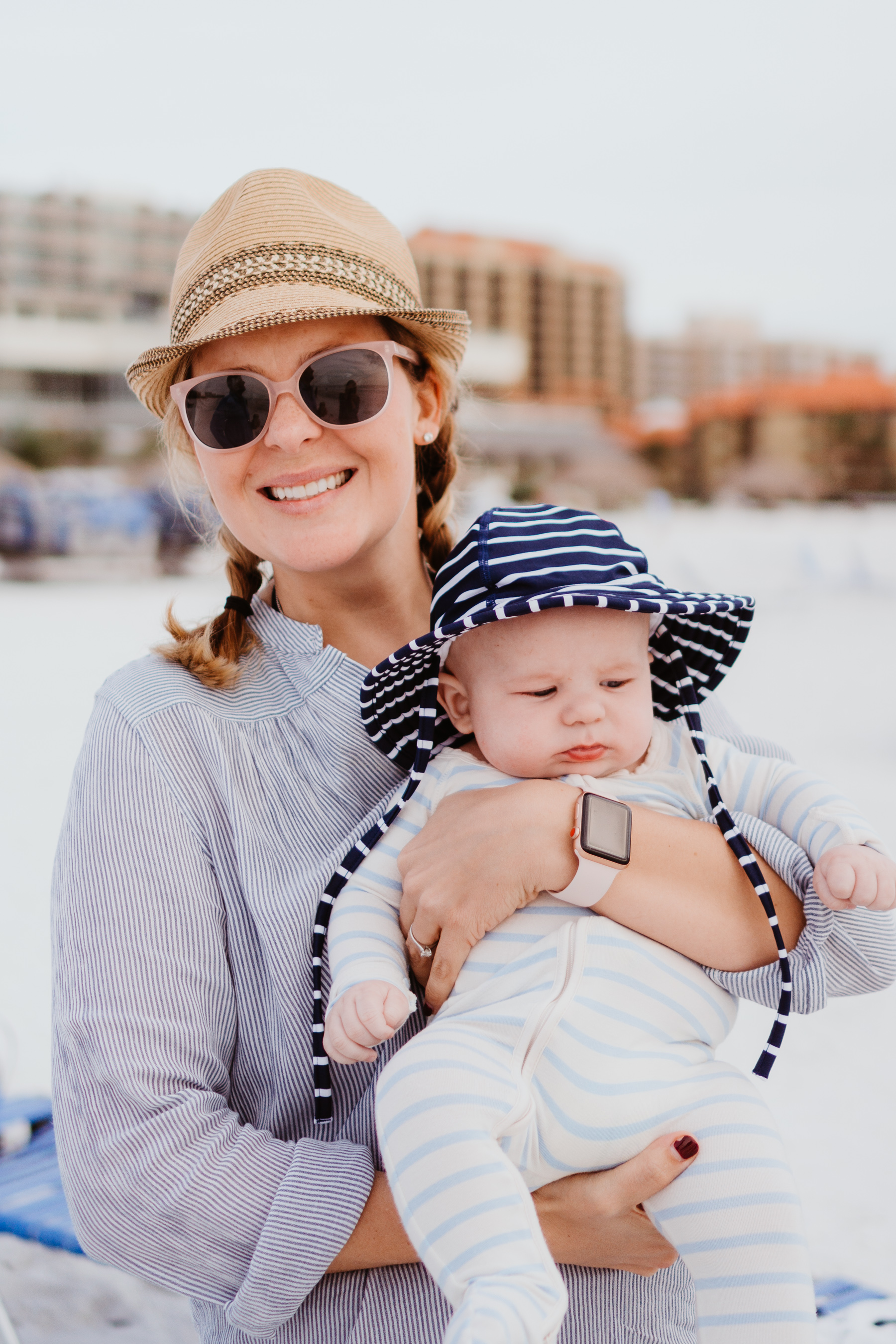 Mother is holding her baby boy