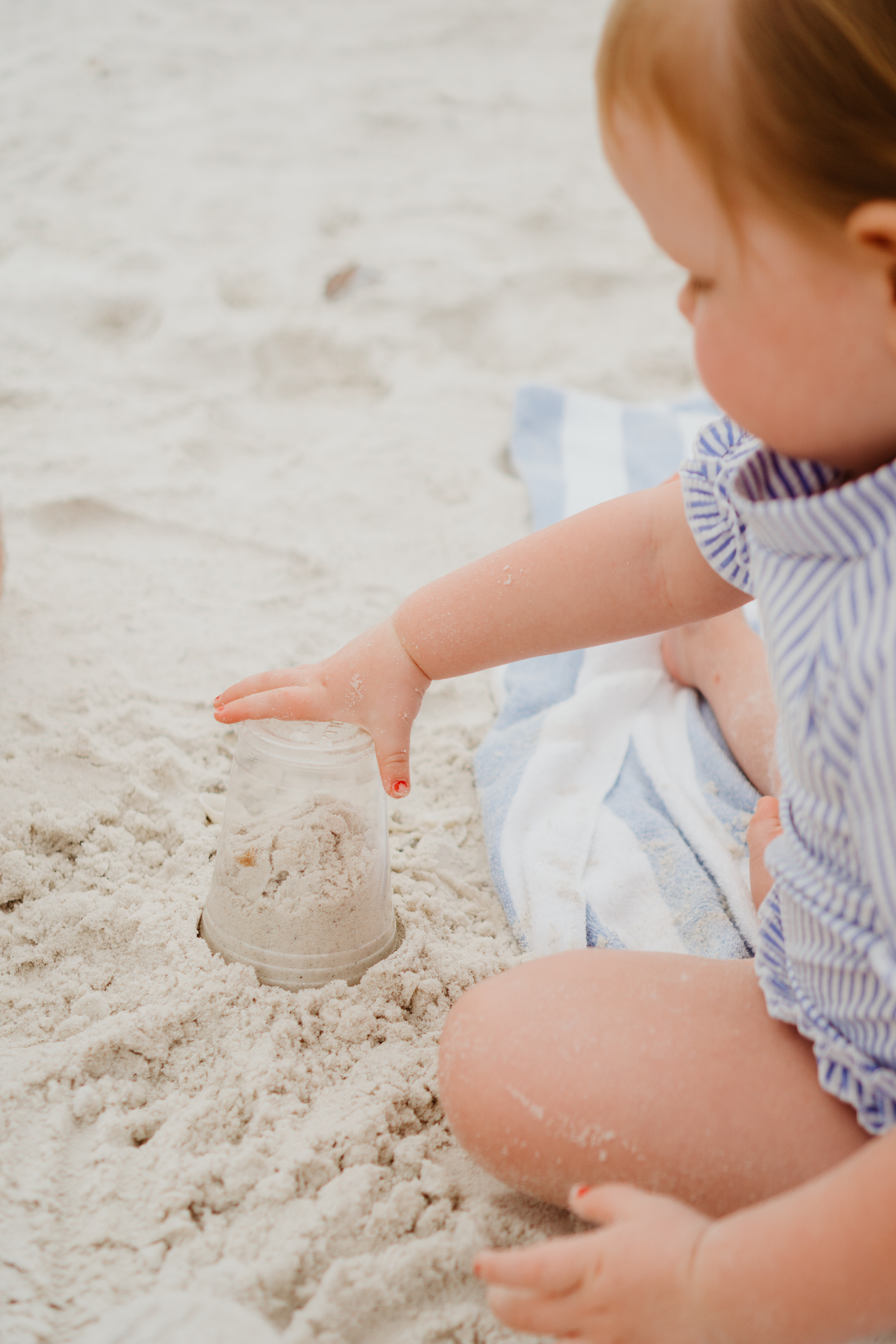 Emma playing with sand