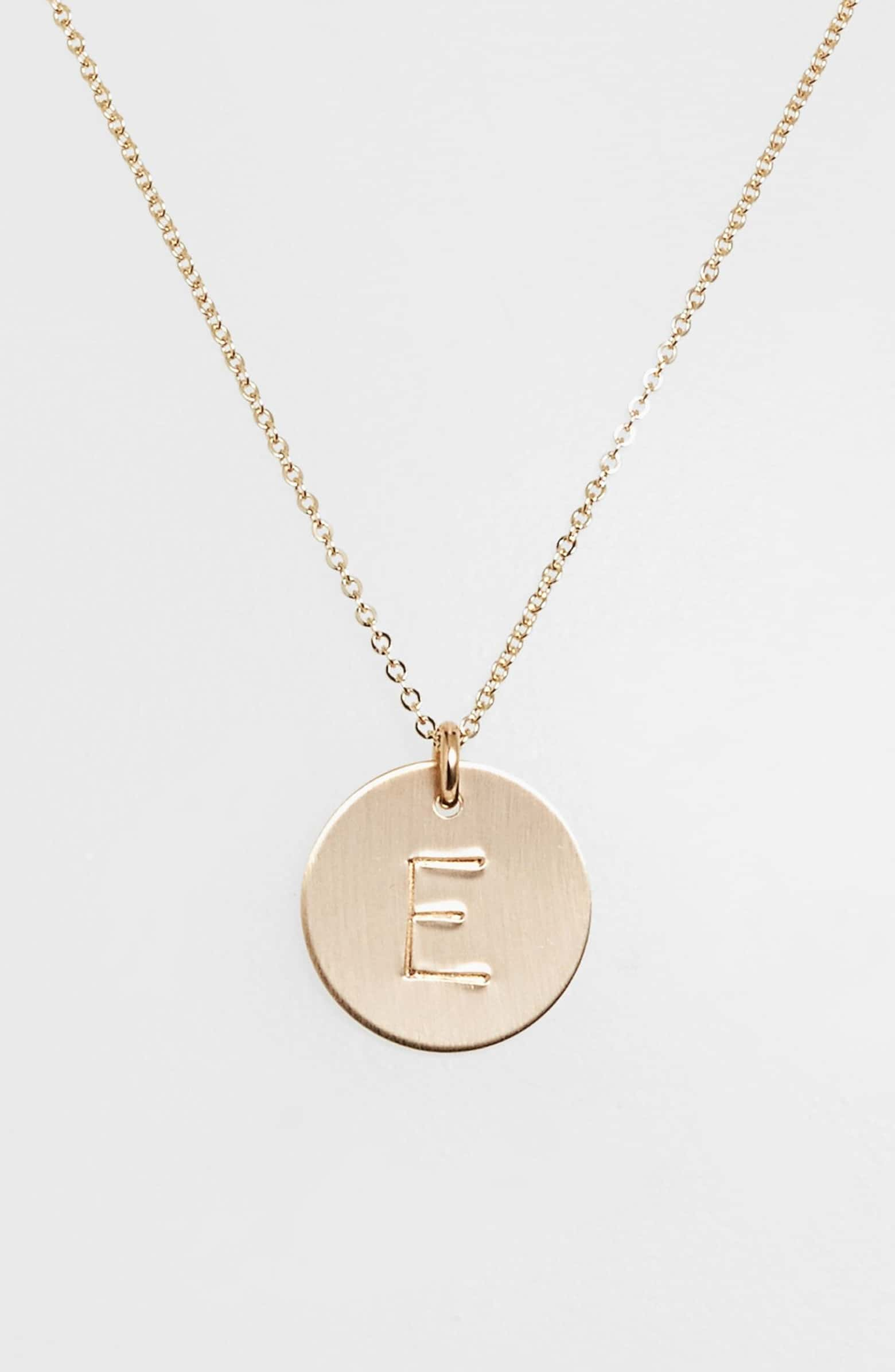 Nashelle's gold initial necklace