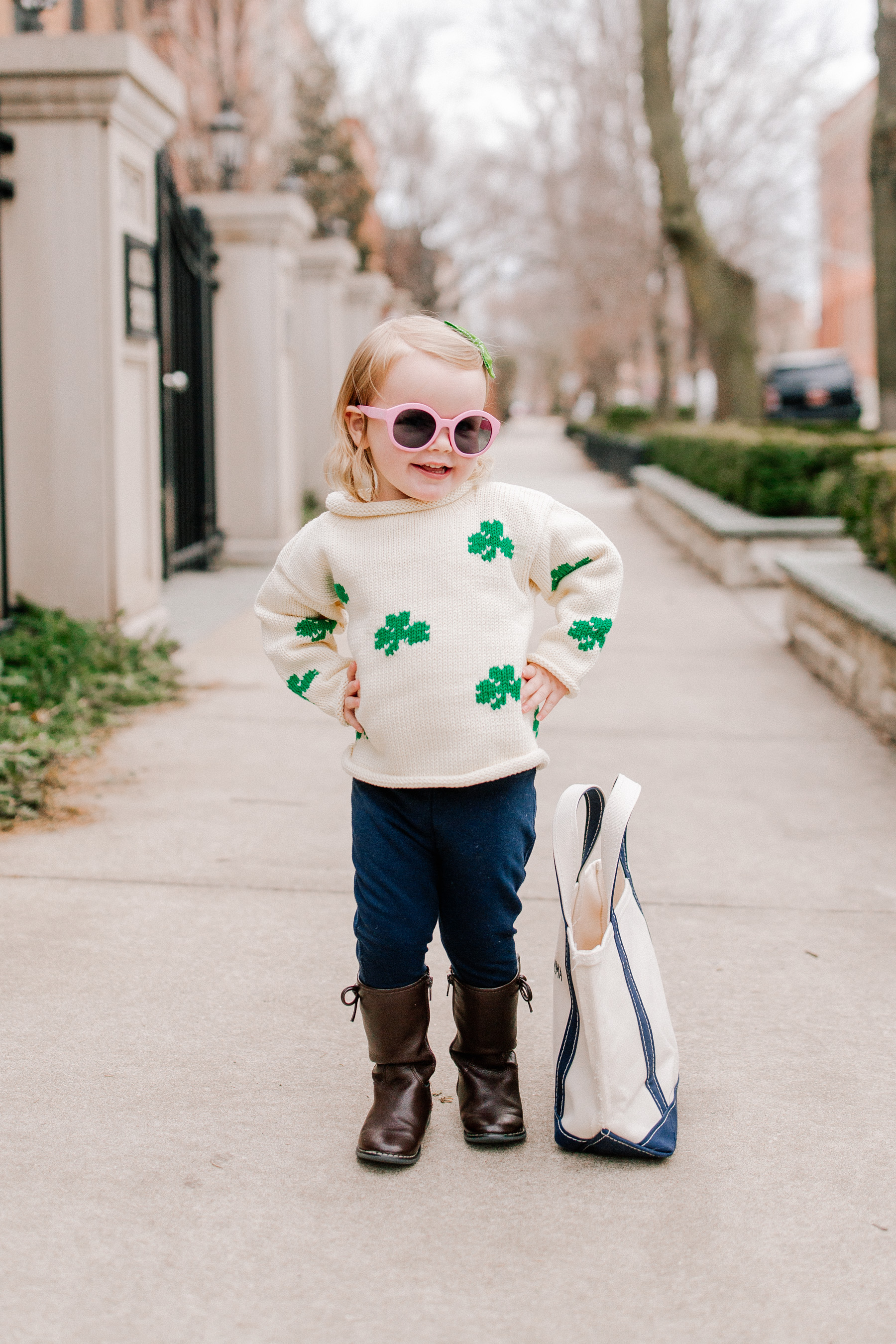 Emma is featuring a Claver Shamrock Sweater / L.L. Bean Tote c/o / Gap Kids Jeggings and Boots / Janie & Jack Sunglasses / Little Makes Big Bow c/o