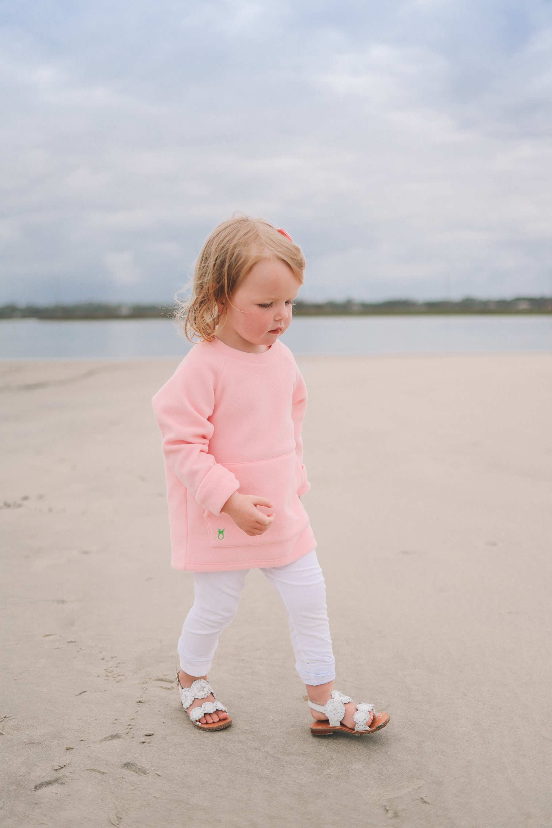 Emma Larkin's outfit: Dudley Stephens Kids' Crewneck, White Leggings and Jack Rogers Sandals.