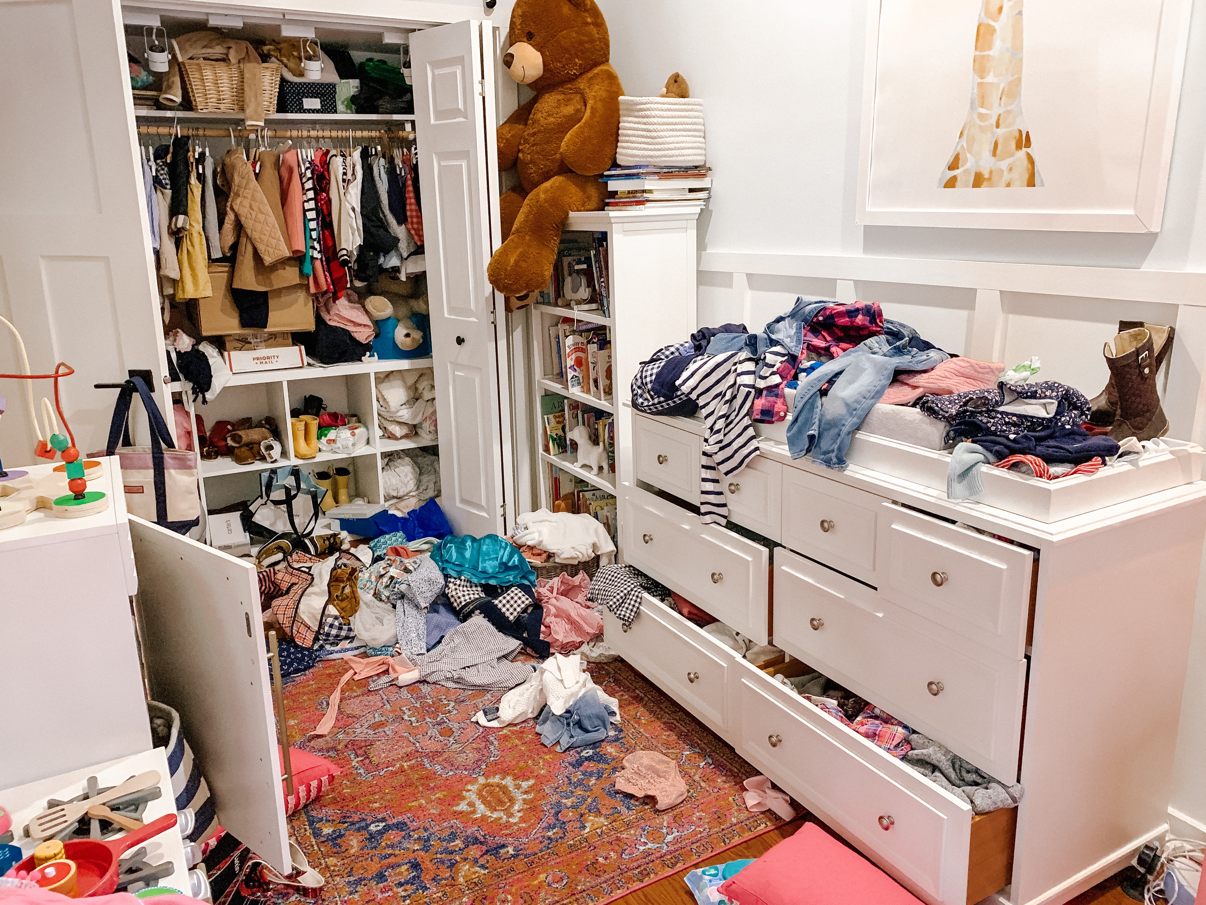 In process: This was taken right after we started emptying the contents of the dresser and closet. TERRIFYING, right? I'm only sharing because come on: your kid's room can't be worse than THIS. 😂