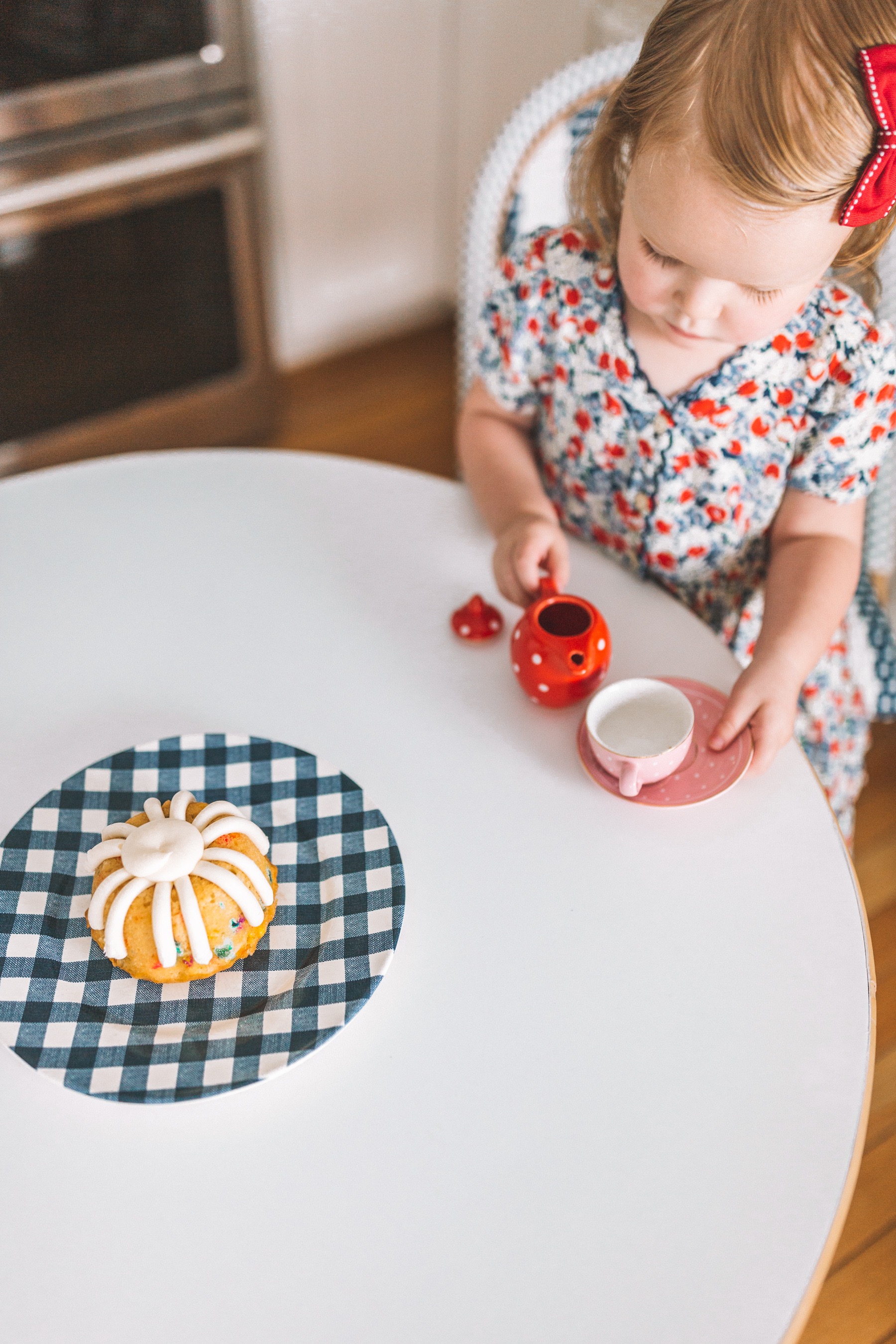 Tea party with a gingham plate and bundt cake 