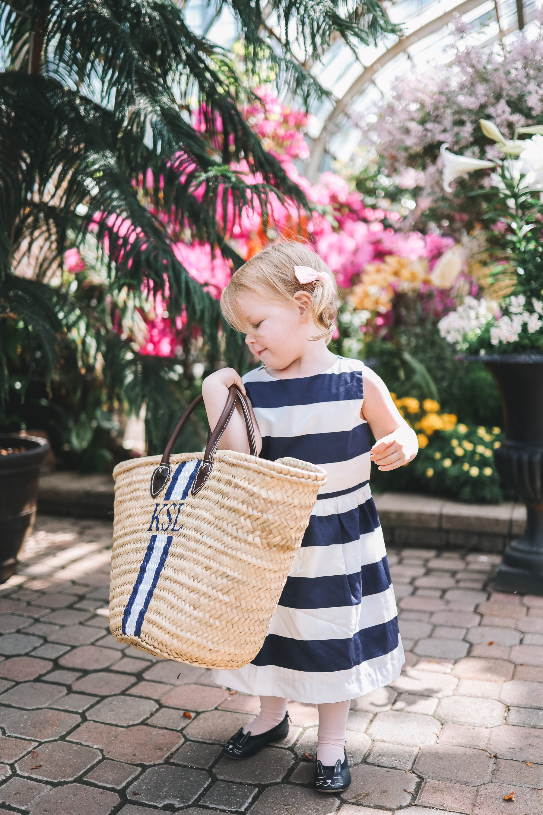 Emma's outfit: J.Crew Factory Navy Striped Dress / Mark & Graham Hand-Painted Straw Tote c/o / Newer Gap Bunny Flats