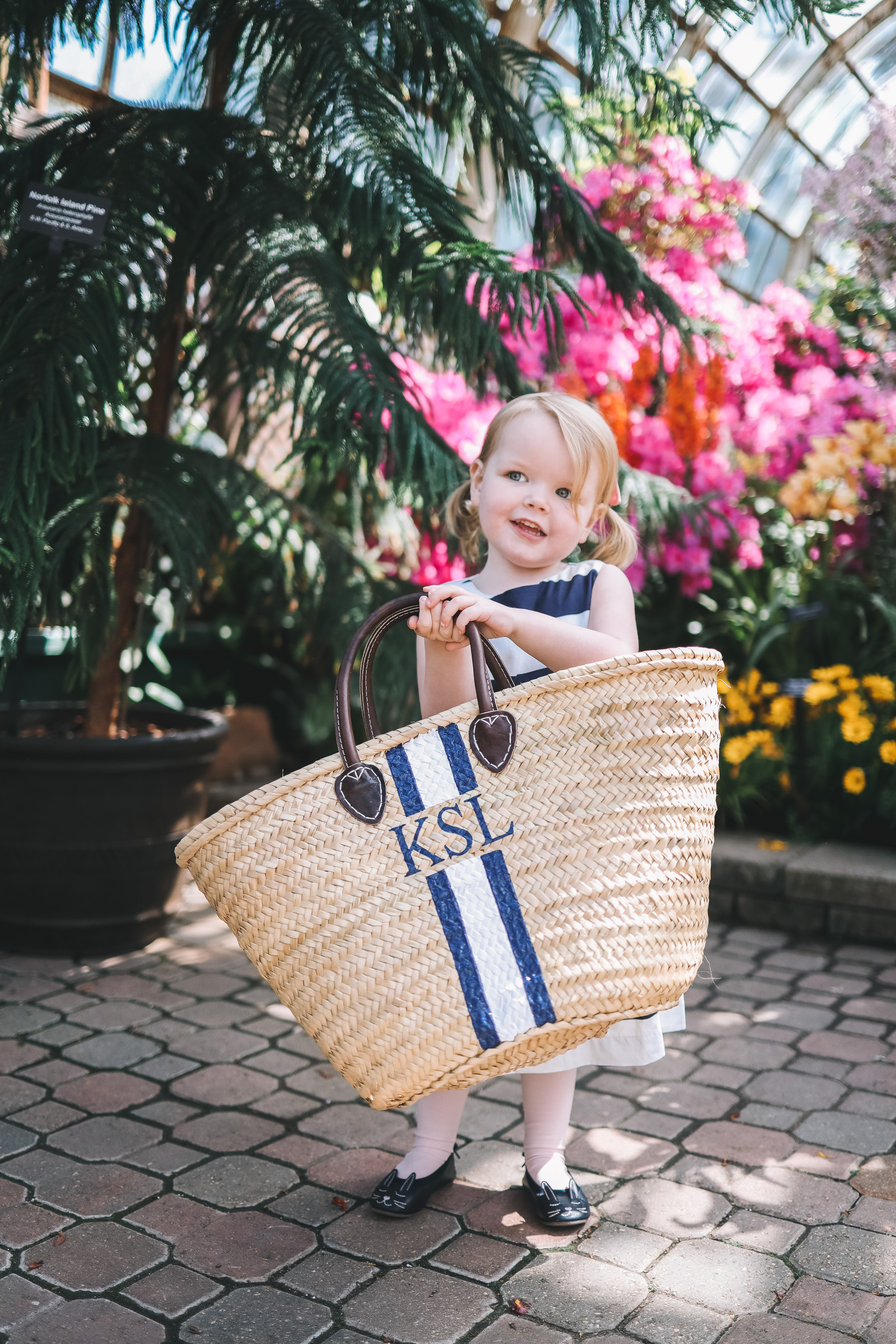 Emma's outfit: J.Crew Factory Navy Striped Dress / Mark & Graham Hand-Painted Straw Tote / Newer Gap Bunny Flats