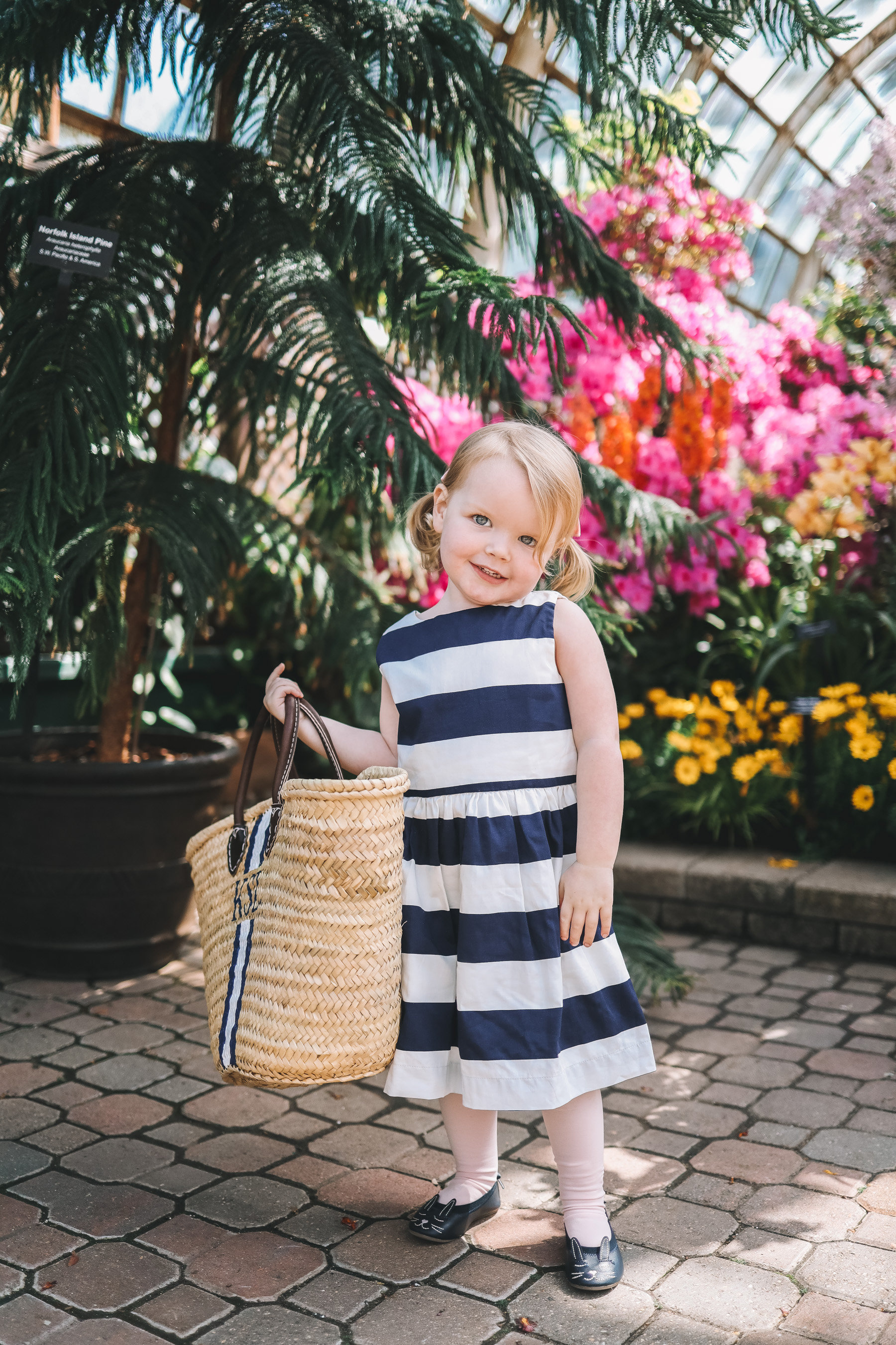Emma's outfit: J.Crew Factory Navy Striped Dress / Mark & Graham Hand-Painted Straw Tote c/o / Newer Gap Bunny Flats
