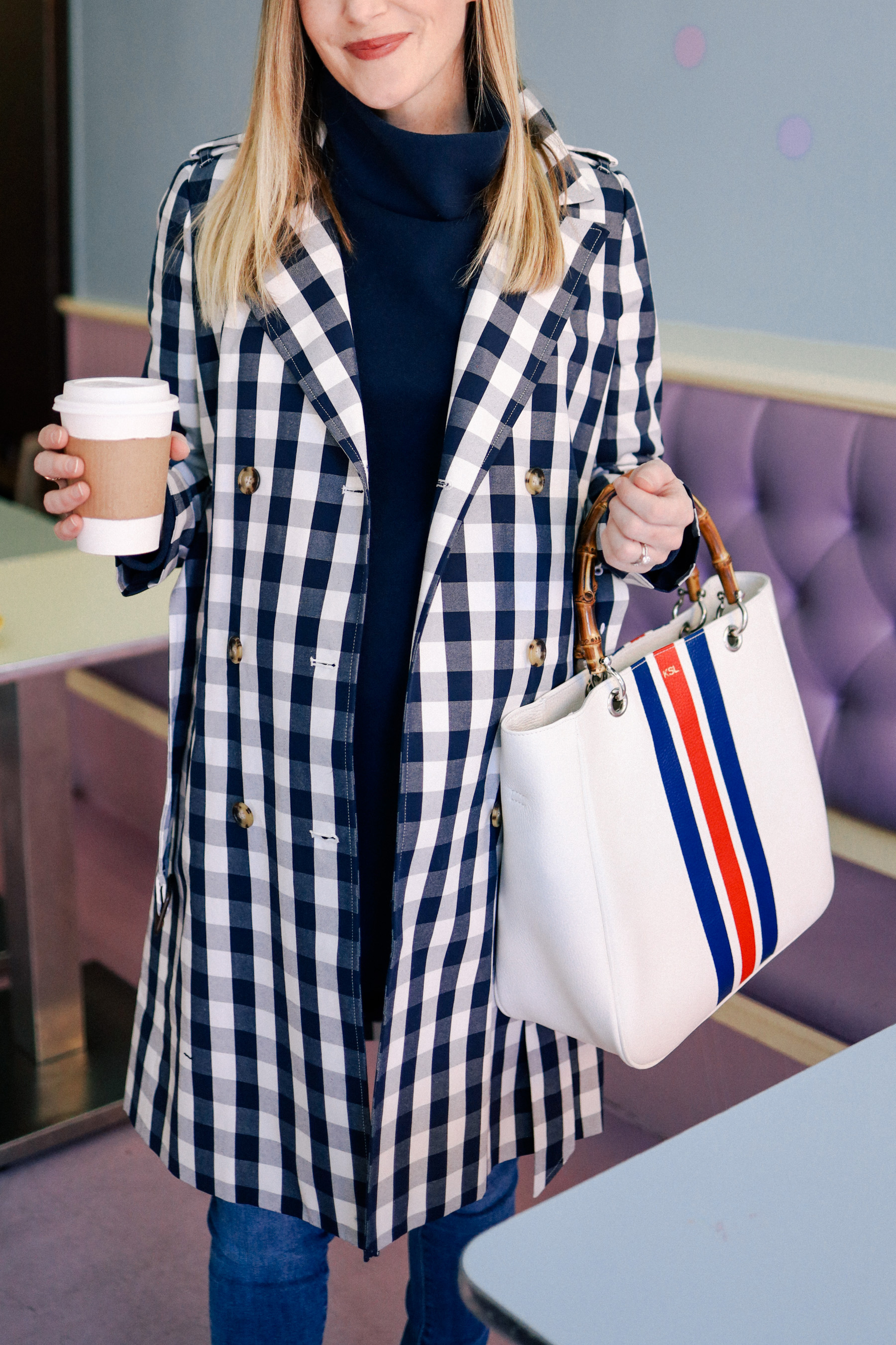 Kelly is wearing a J.Crew Gingham Trench Coat