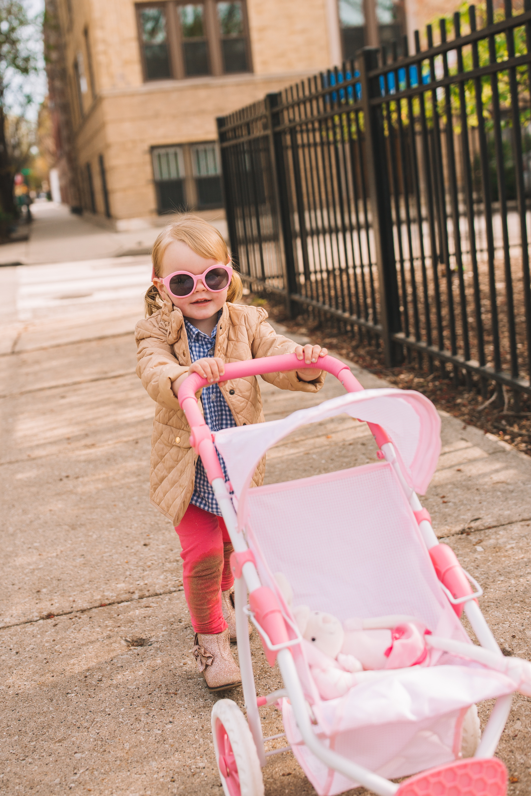 Emma is wearing some preppy toddler play clothes 