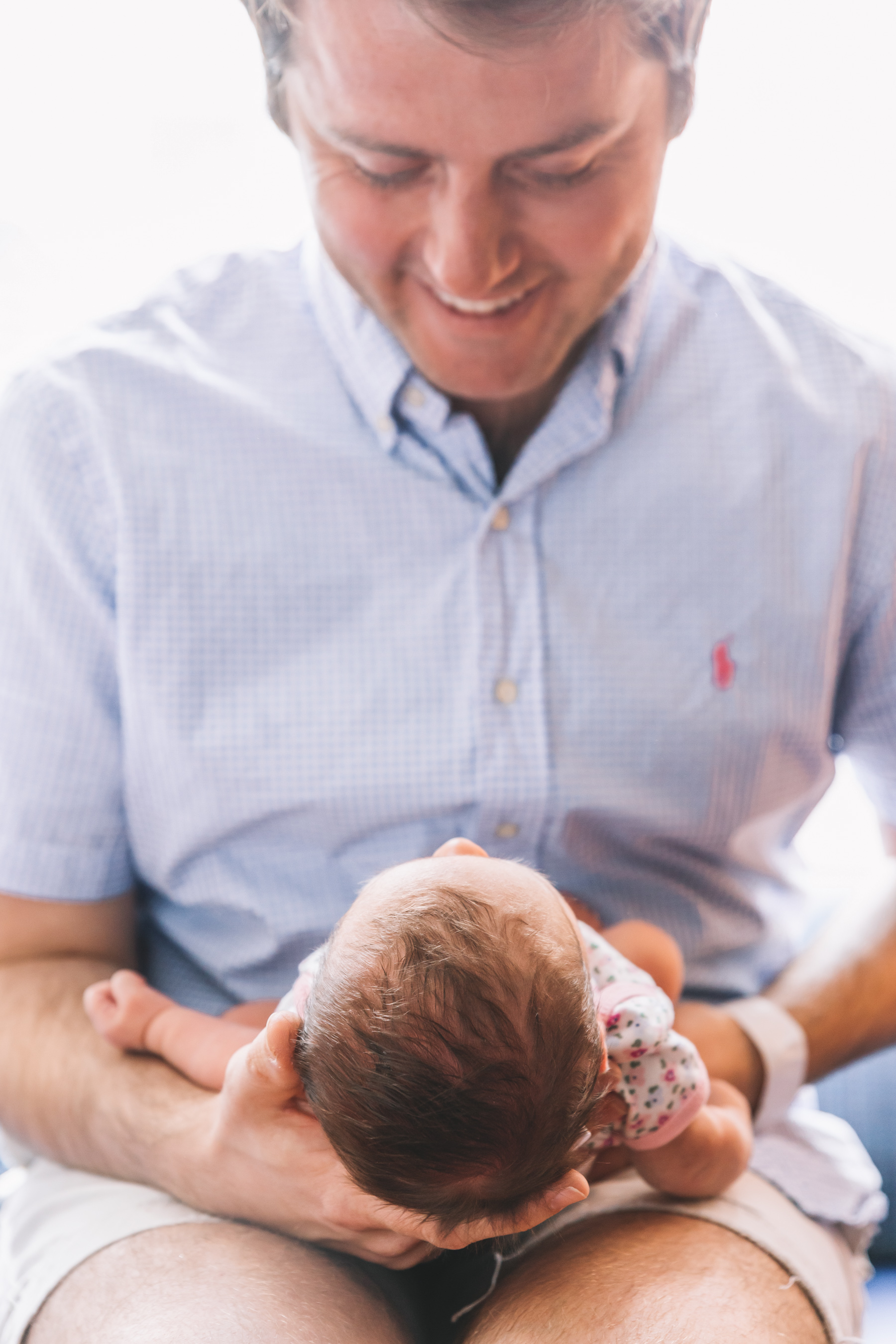 Mitch Larkin is holding his daughter