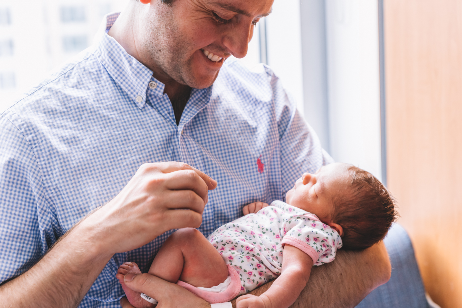 Mitch is holding his daugther