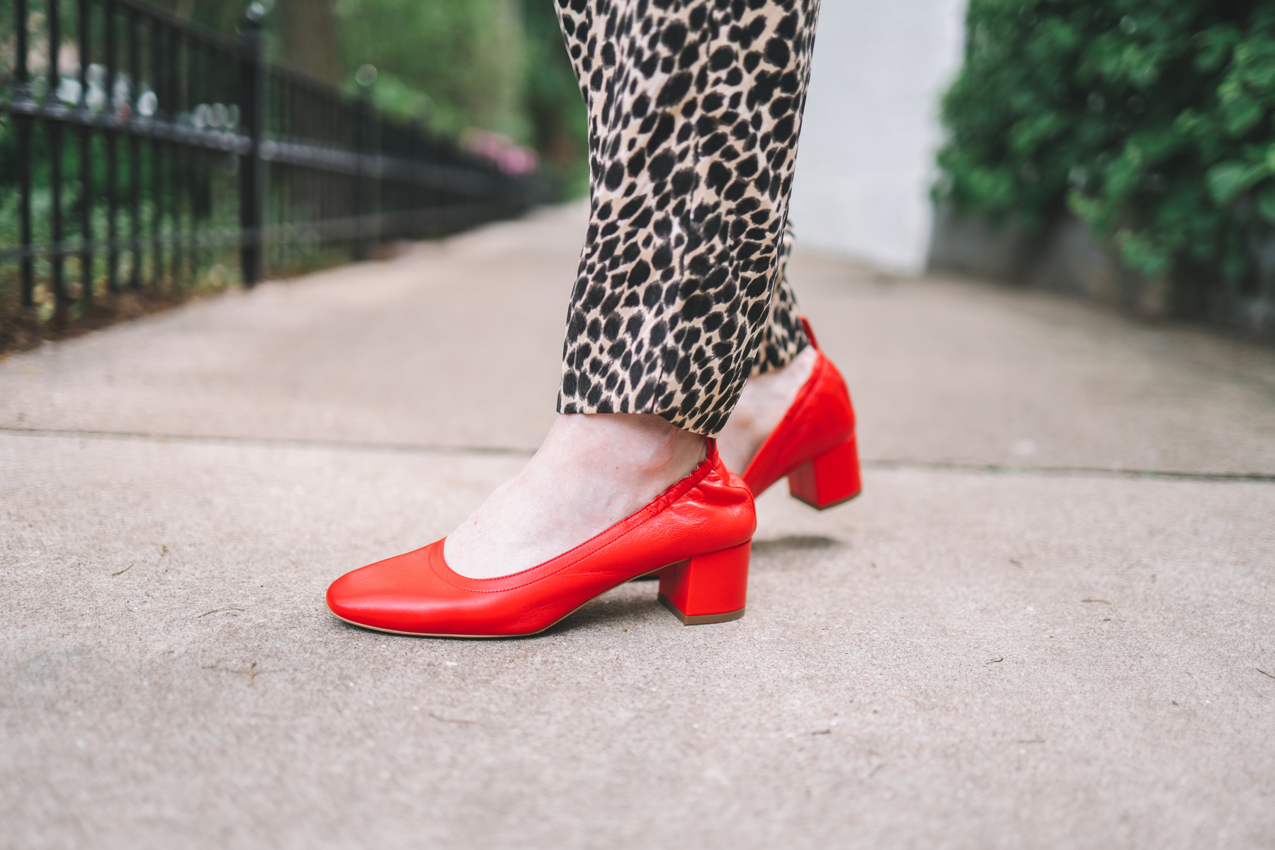 Kelly Larkin's outfit details: J.Crew Factory Pull-On Leopard Jamie Pants / Everlane Day Heels