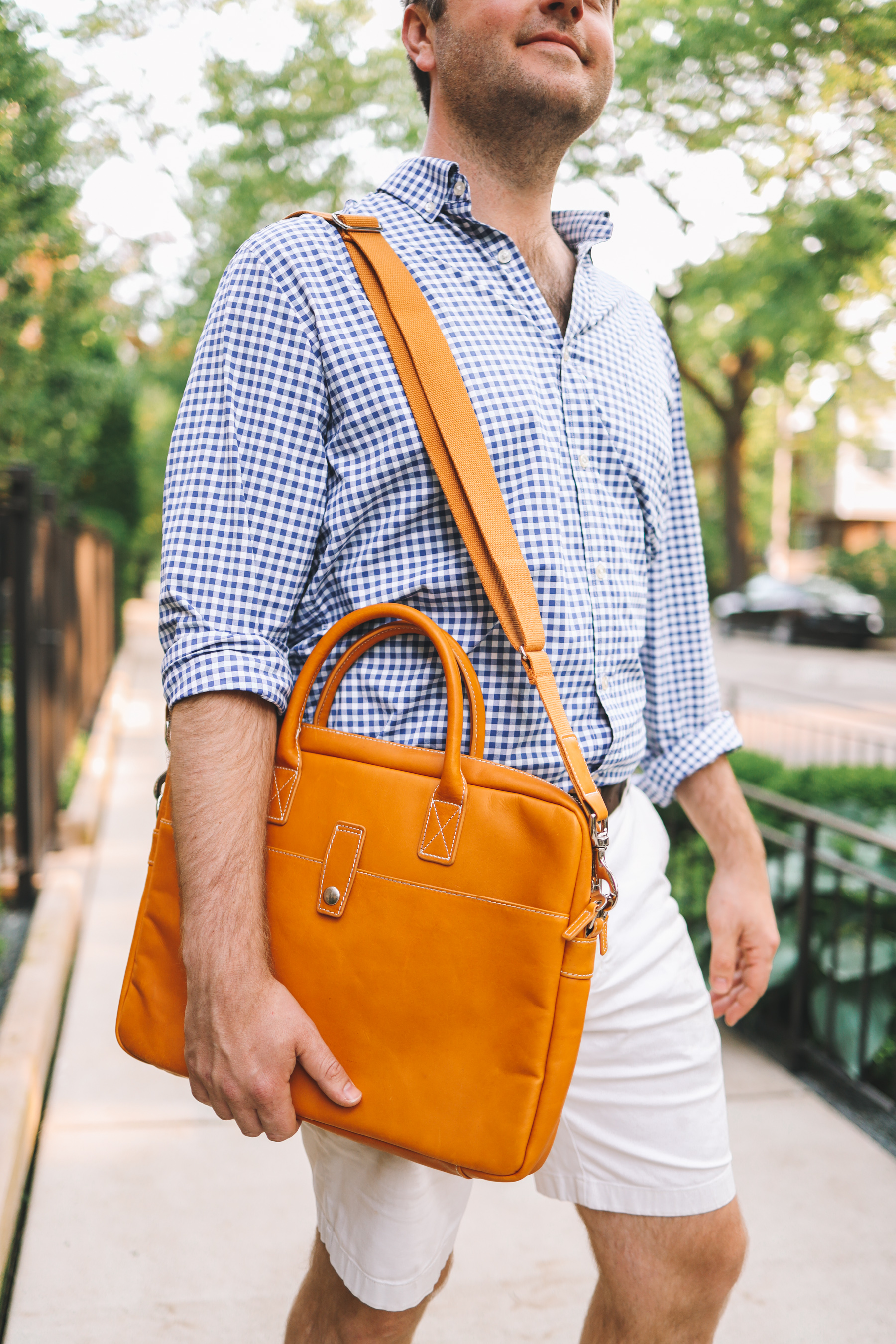 Mitch is carrying a Leather Briefcase from Mark and Graham 