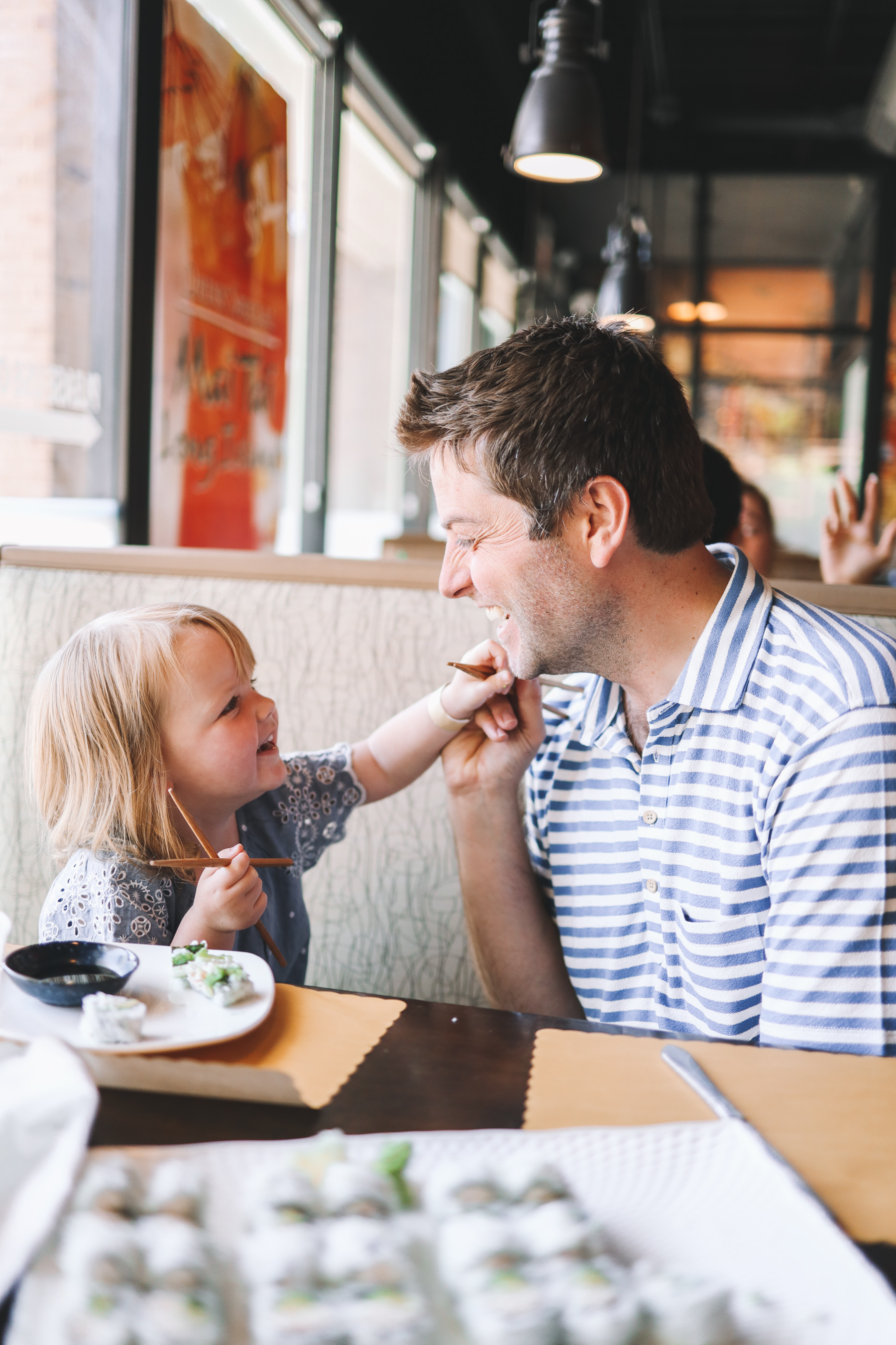 sushi time - father and daughter