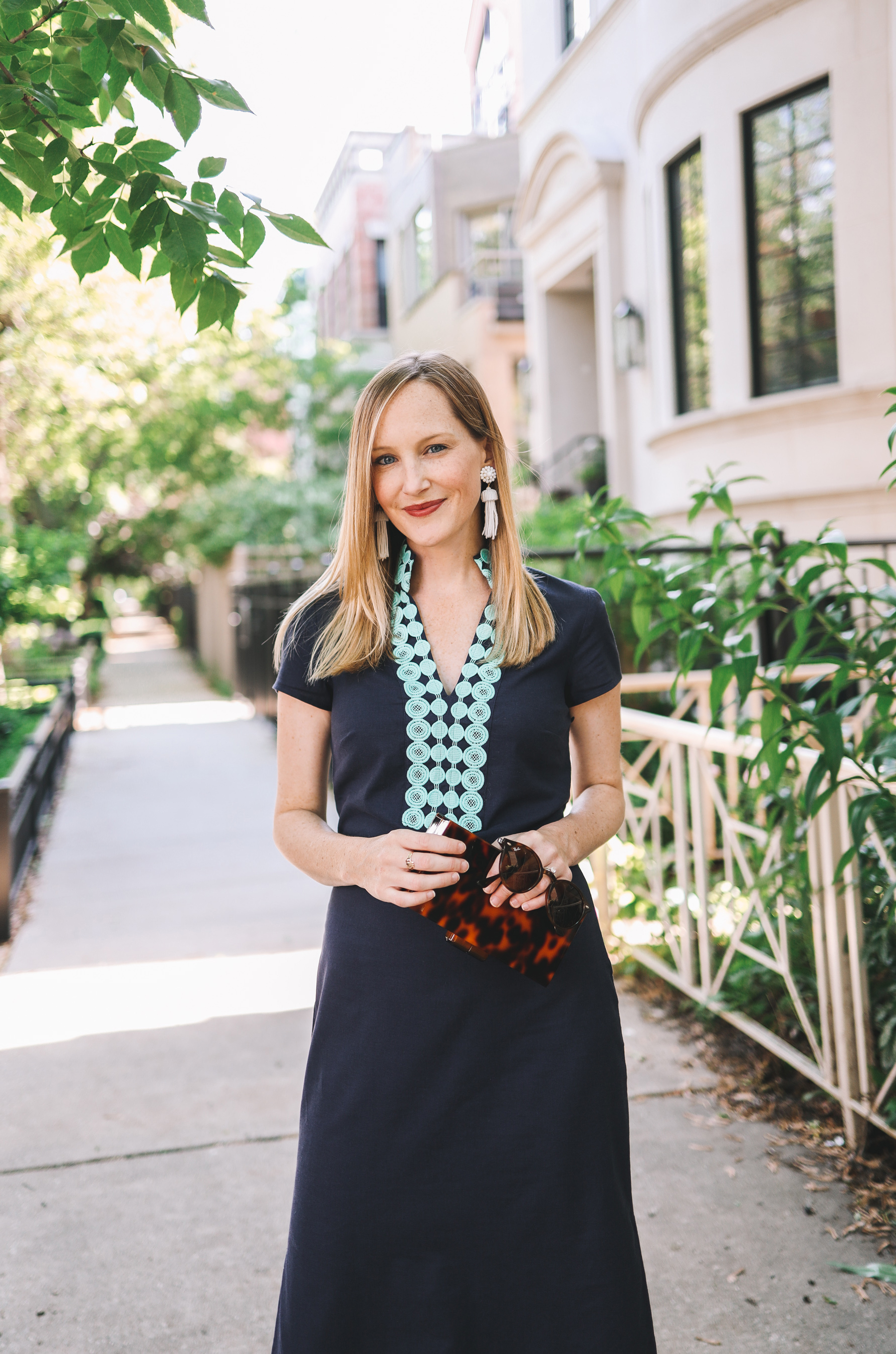 Kelly Larkin is wearing a Sail to Sable maxi dress