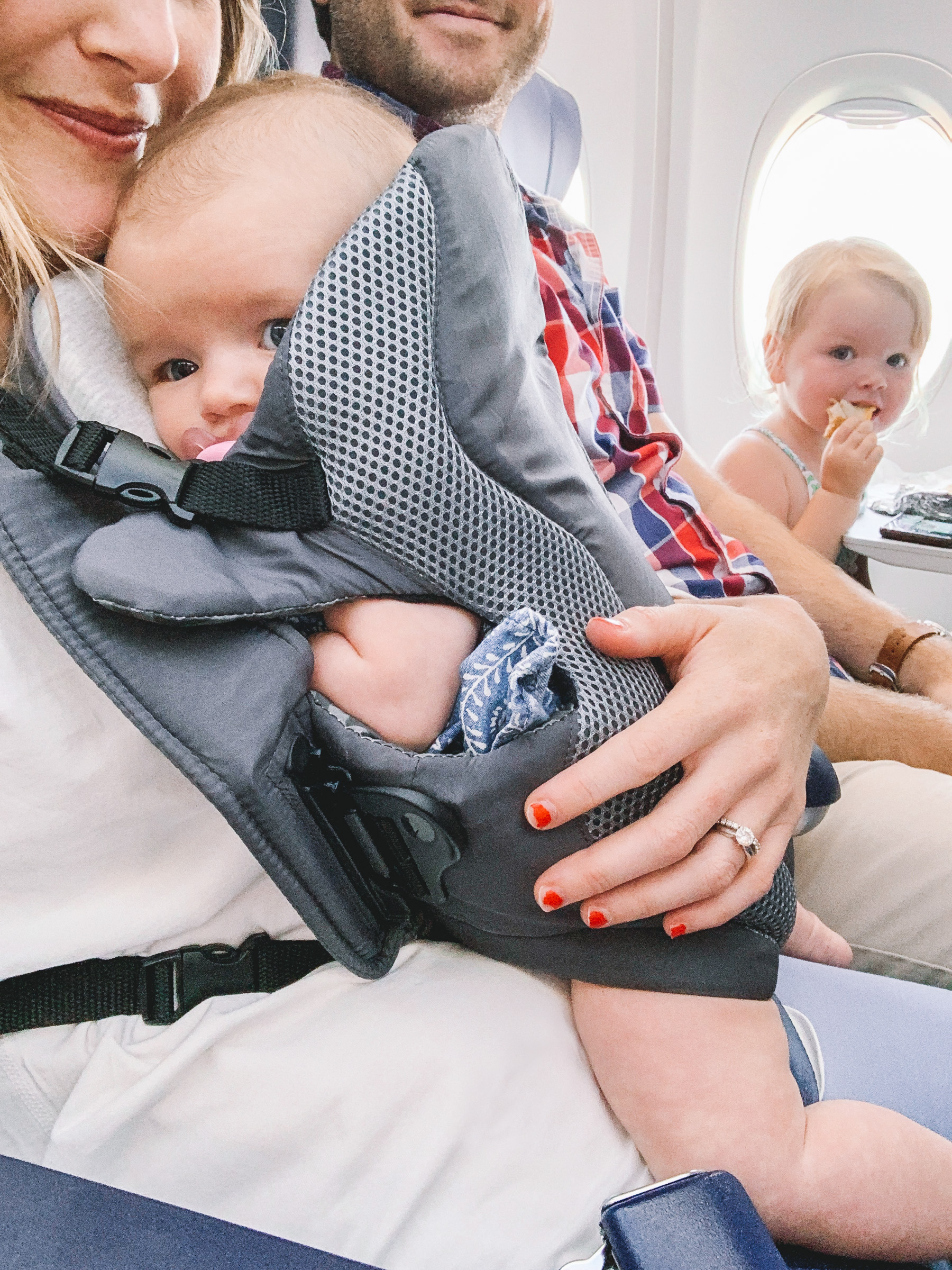 Baby carrier 2024 on plane