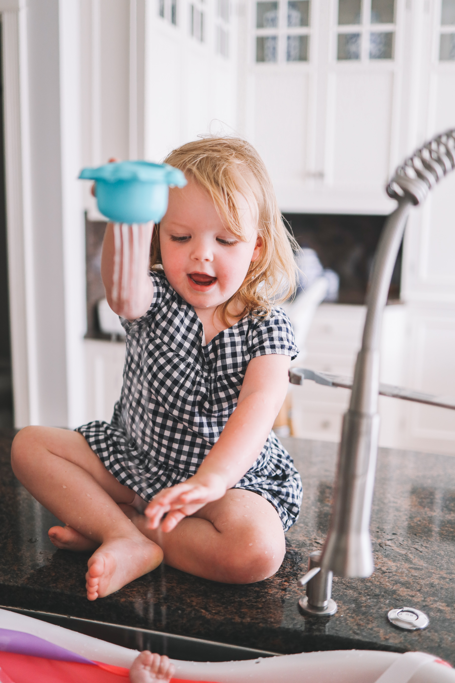 emma is playing with water