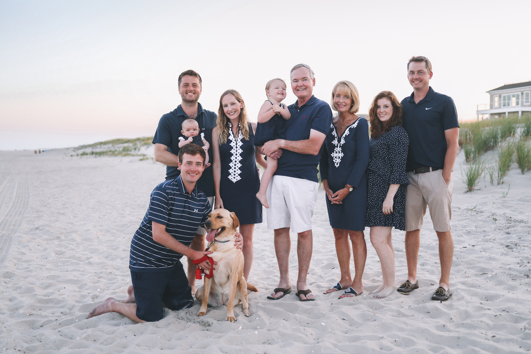 the whole family smiles for Christmas cards