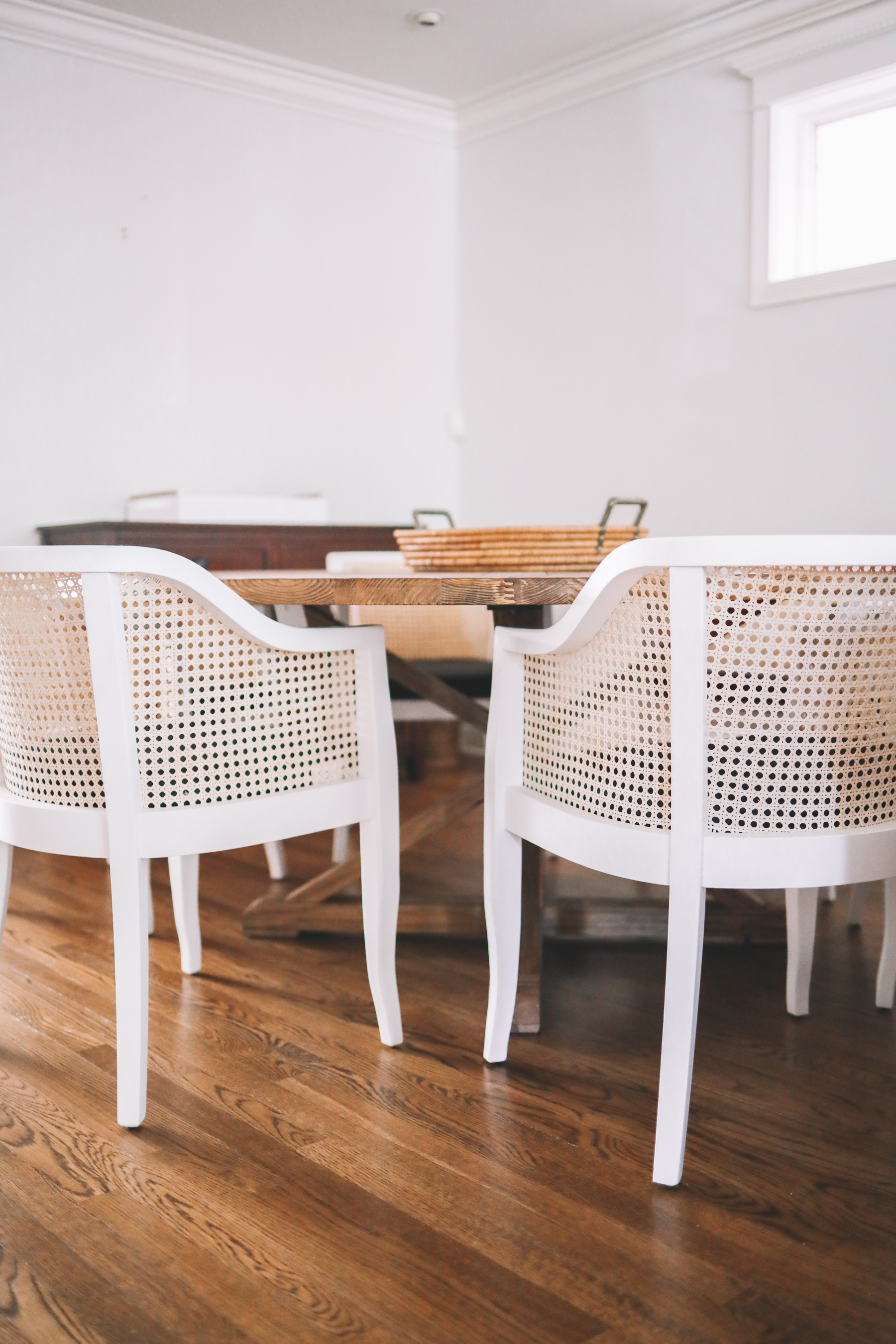 Pine Dining Table with white Cane Chairs