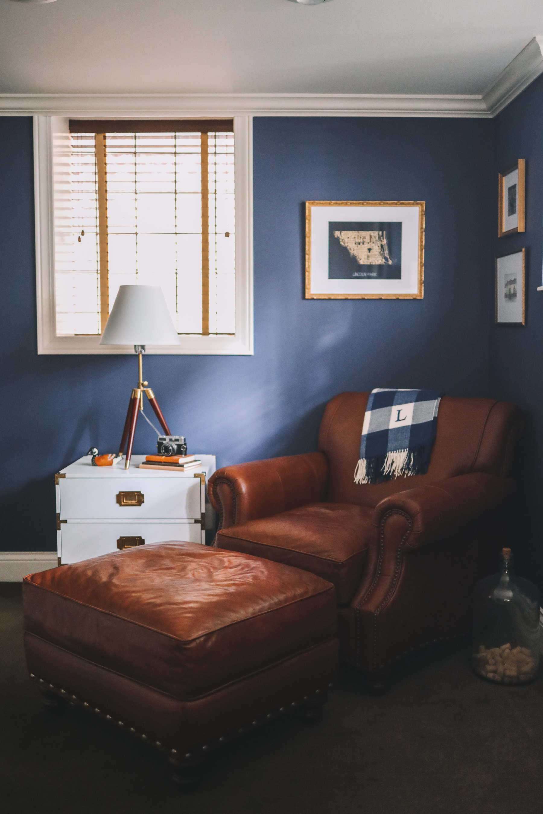 navy office and a leather sofa