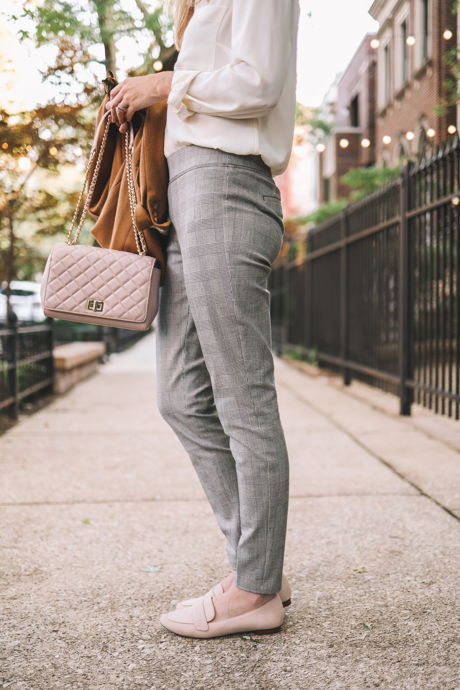 fall look of pants and a white shirt