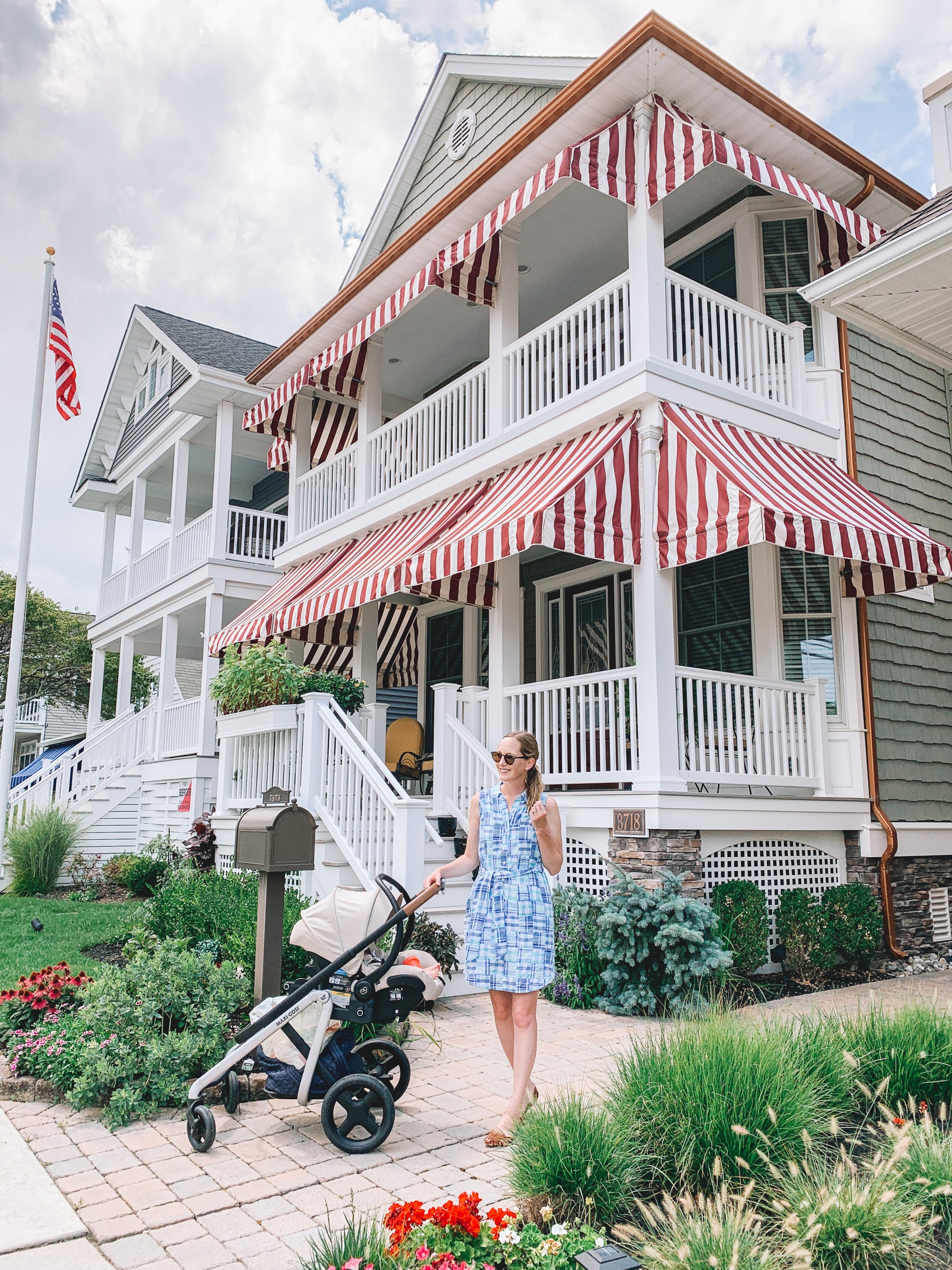 stripes on stripes, kelly strolls out of their Jersey home in a VV dress