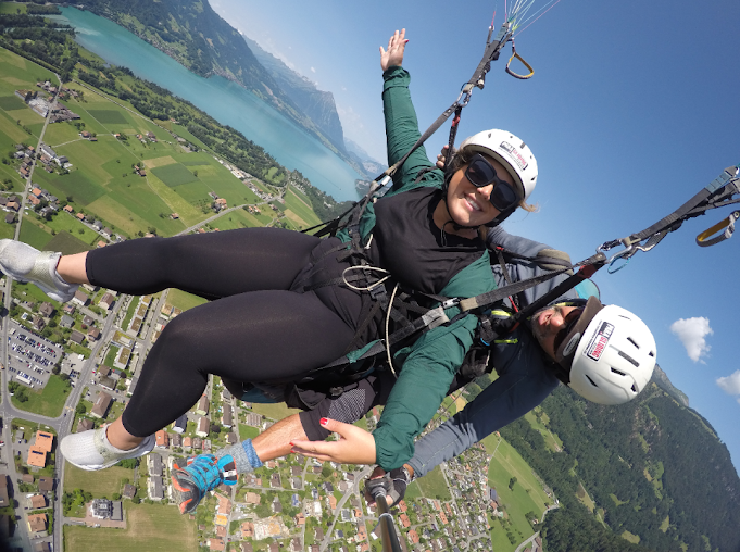 a woman who is paragliding 