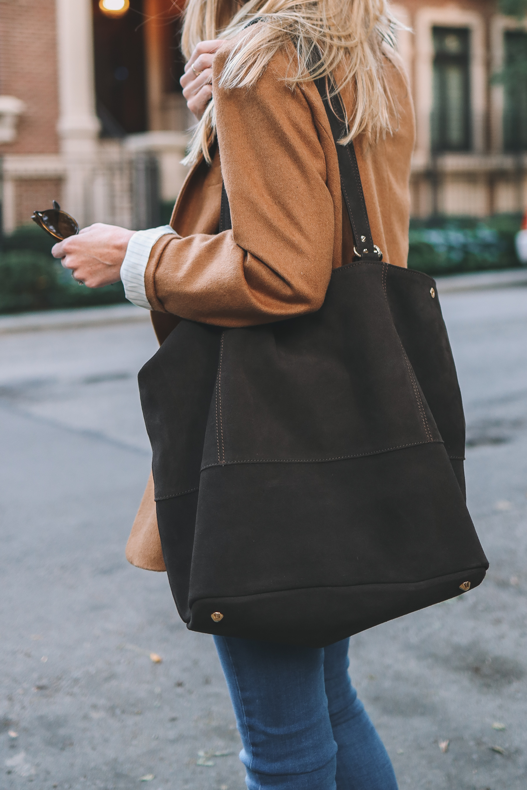 Mark & Graham Amalfi Italin Suede Tote and a girl wearing it with a tan jacket