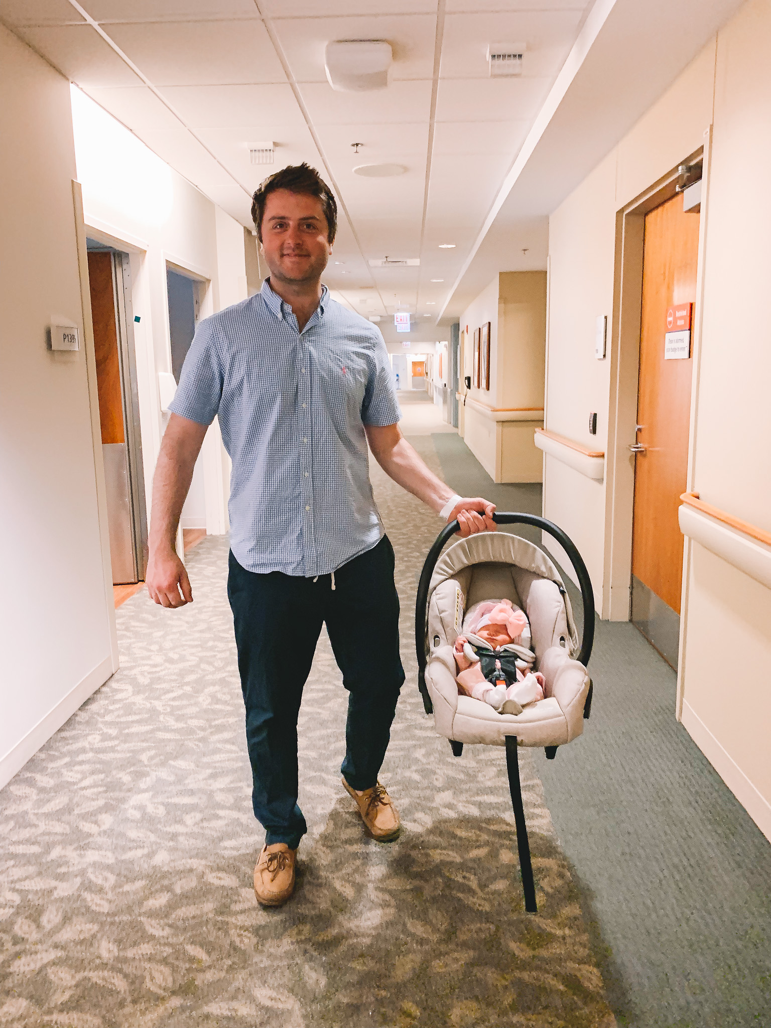dad and newborn in carrier | Lucys Delivery Story