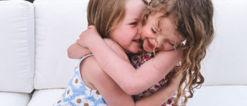 little girls hugging | 20 Things 5/16