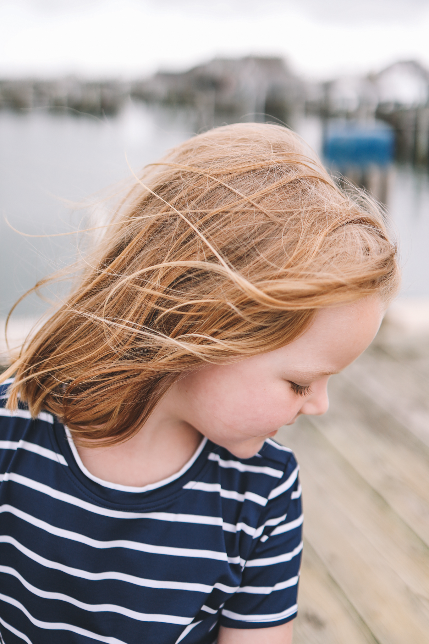 little girl's hair blown by the wind