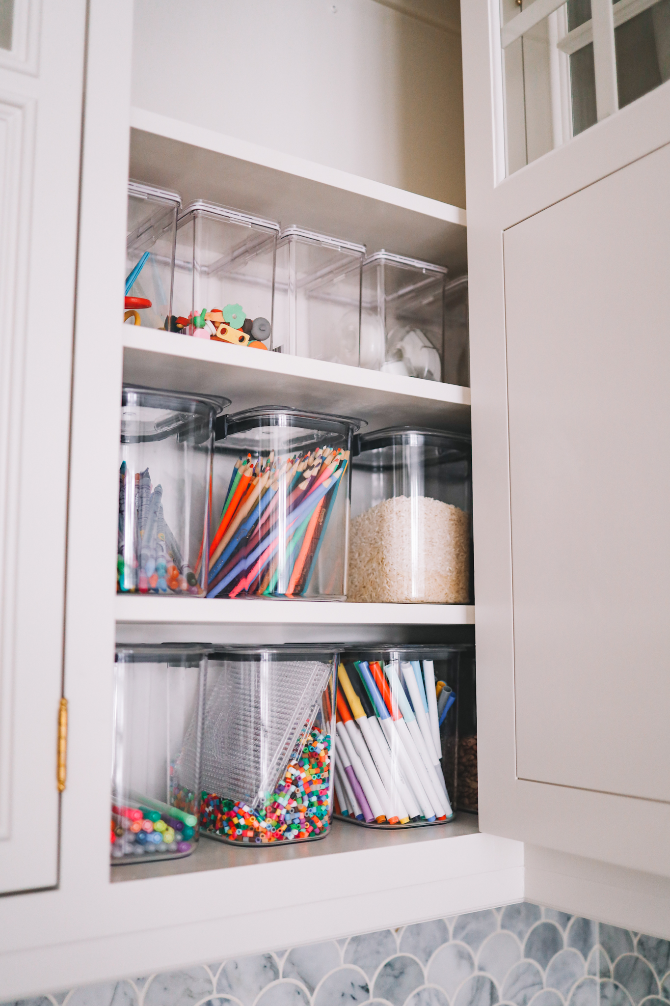 How I Organized Our Craft Cabinets