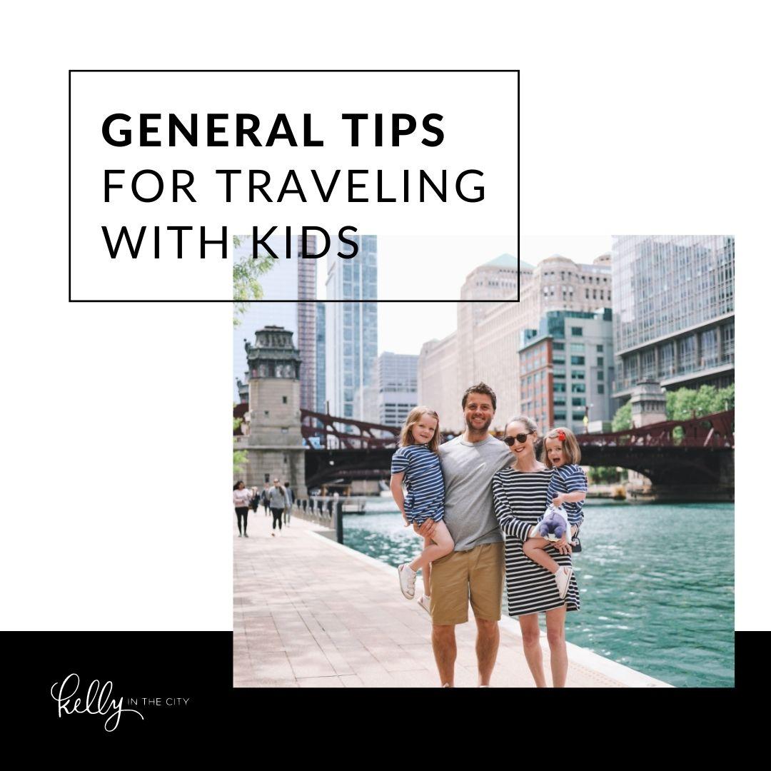 Kelly, Mitch, and their daughters posing for a family photo on vacation